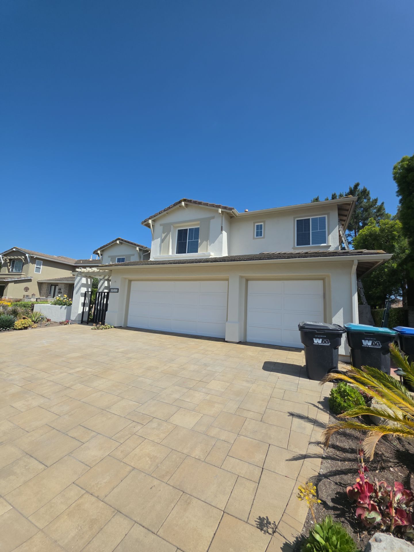Exterior painting of this newly remodeled Mission Viejo home. by Beach City Painting