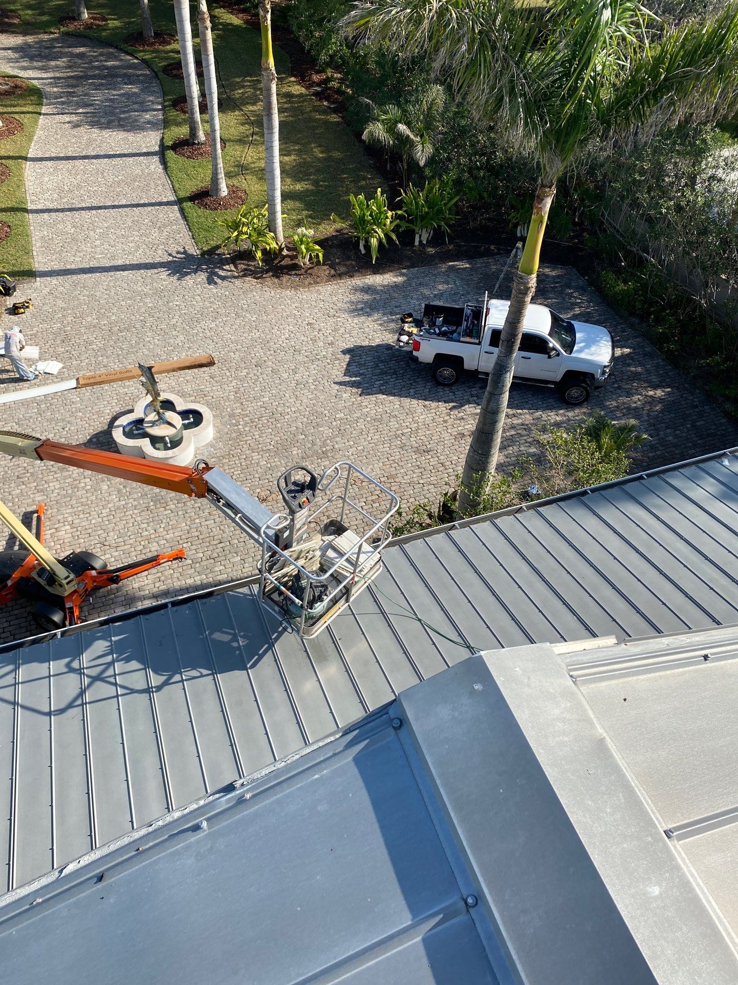 Seamless Gutter Installation for Beach Homes in Sarasota FL by Gutter Professors