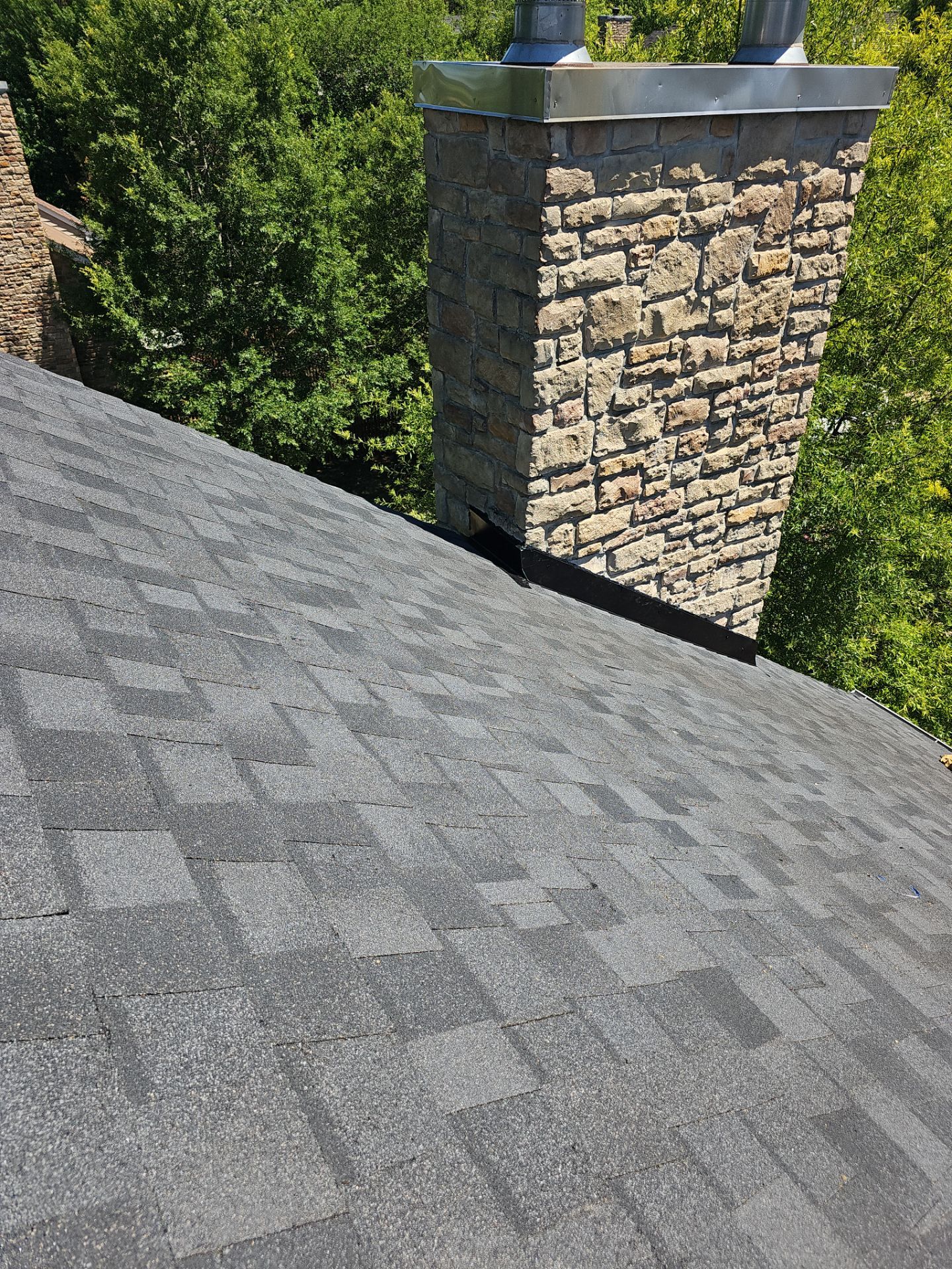 Roof Replacement - Moire Black by Winchester Roofing