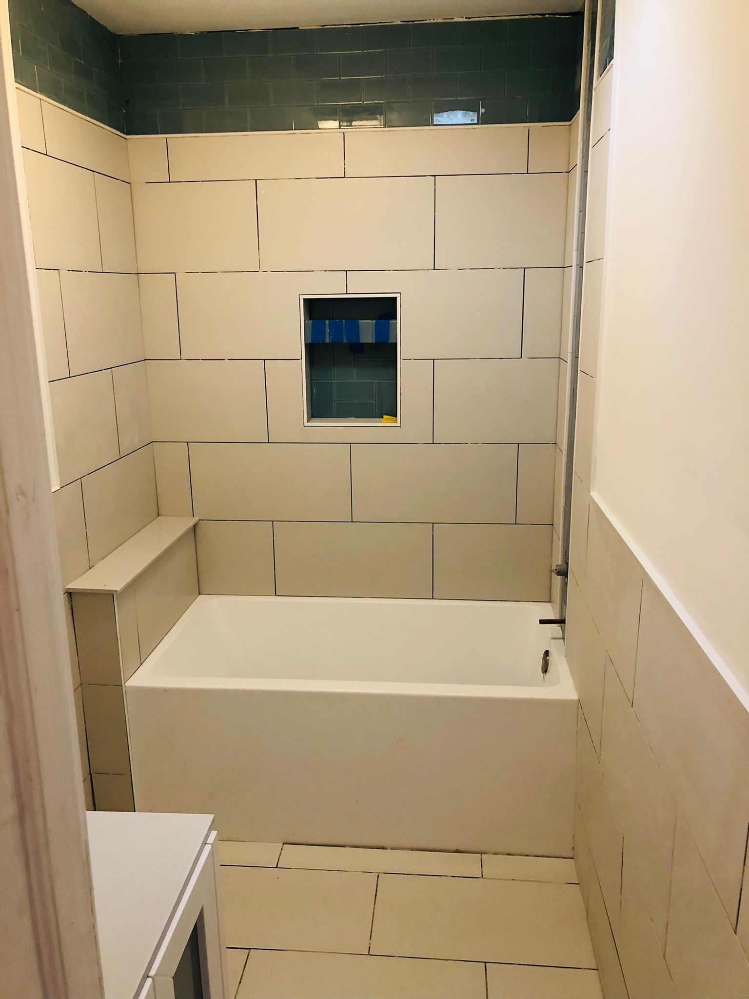 Bathroom Remodel using Tile by Home Concepts Construction
