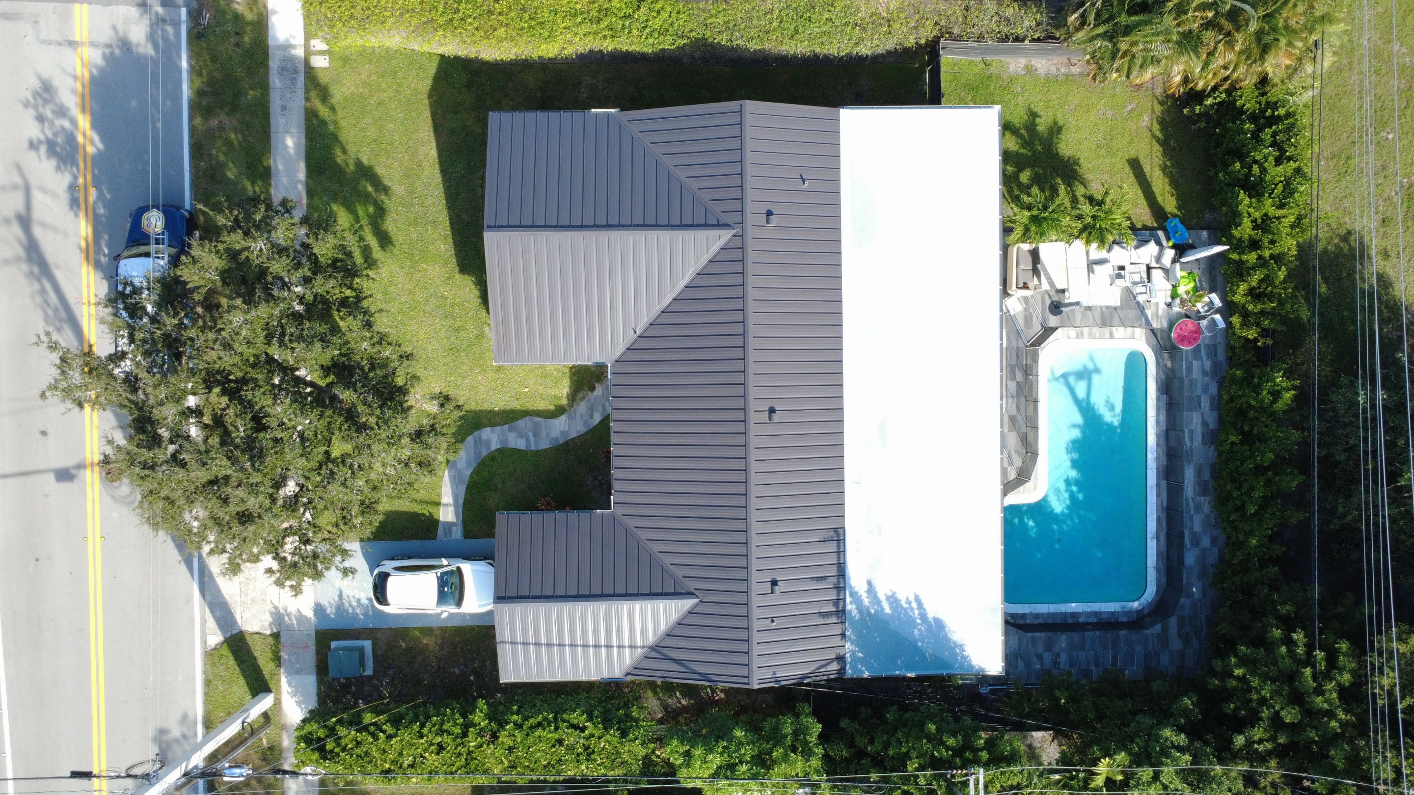 Residential Roofing Installation using 1" Nail strip metal roof by BLUES BROTHERS ROOFING
