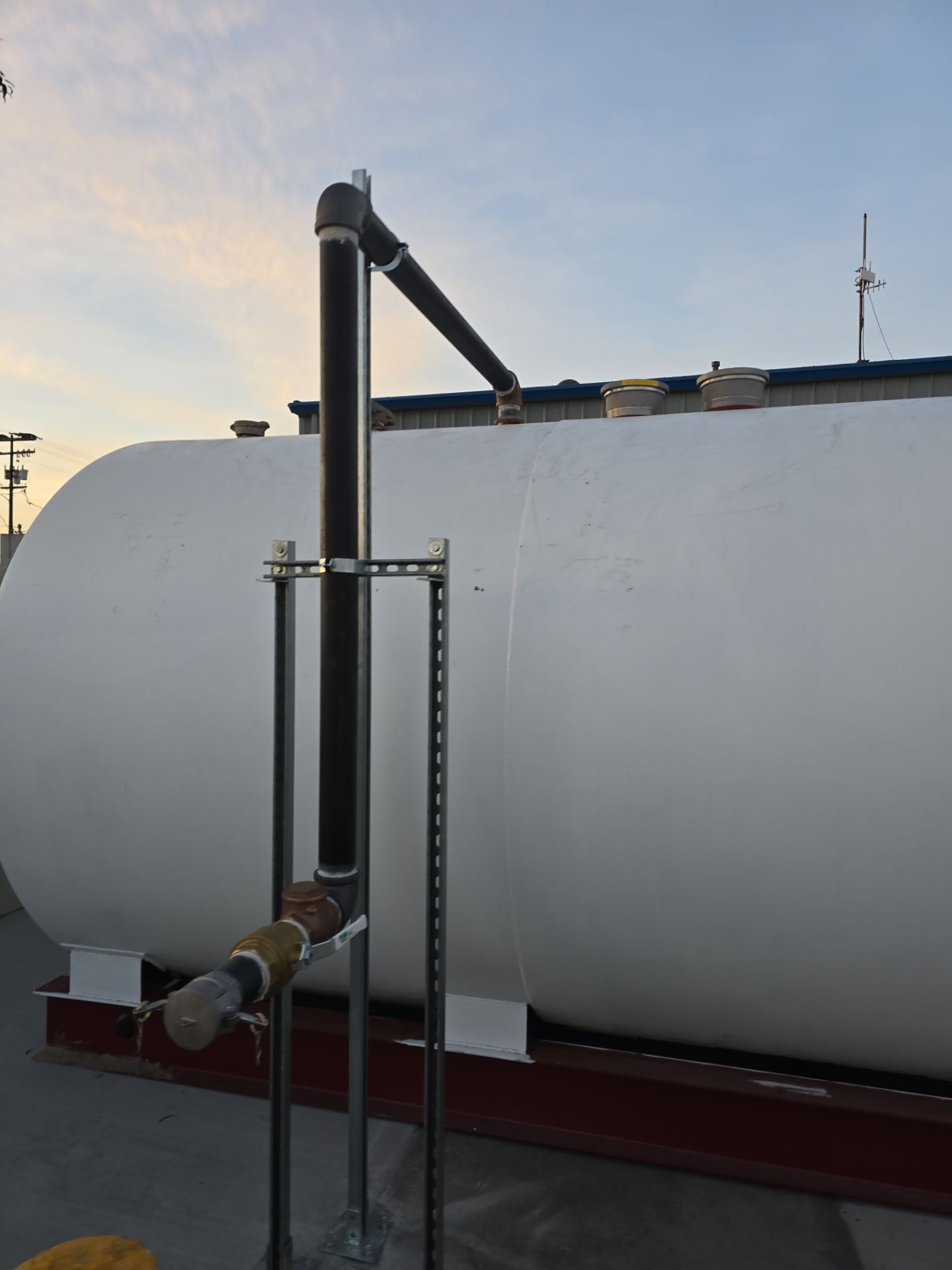 Outdoor Water Tank Installation & Piping Setup by Us Plumbing