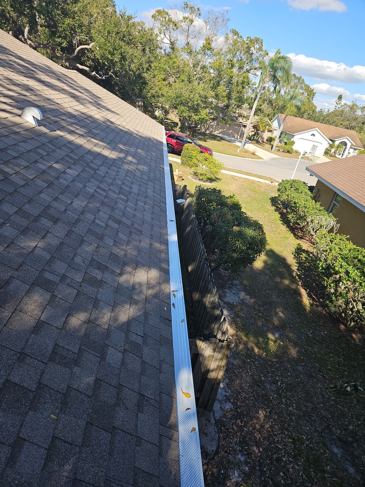 Seamless Aluminum Gutter Installation using 6 Inch Seamless Gutters in Sarasota FL by Gutter Professors