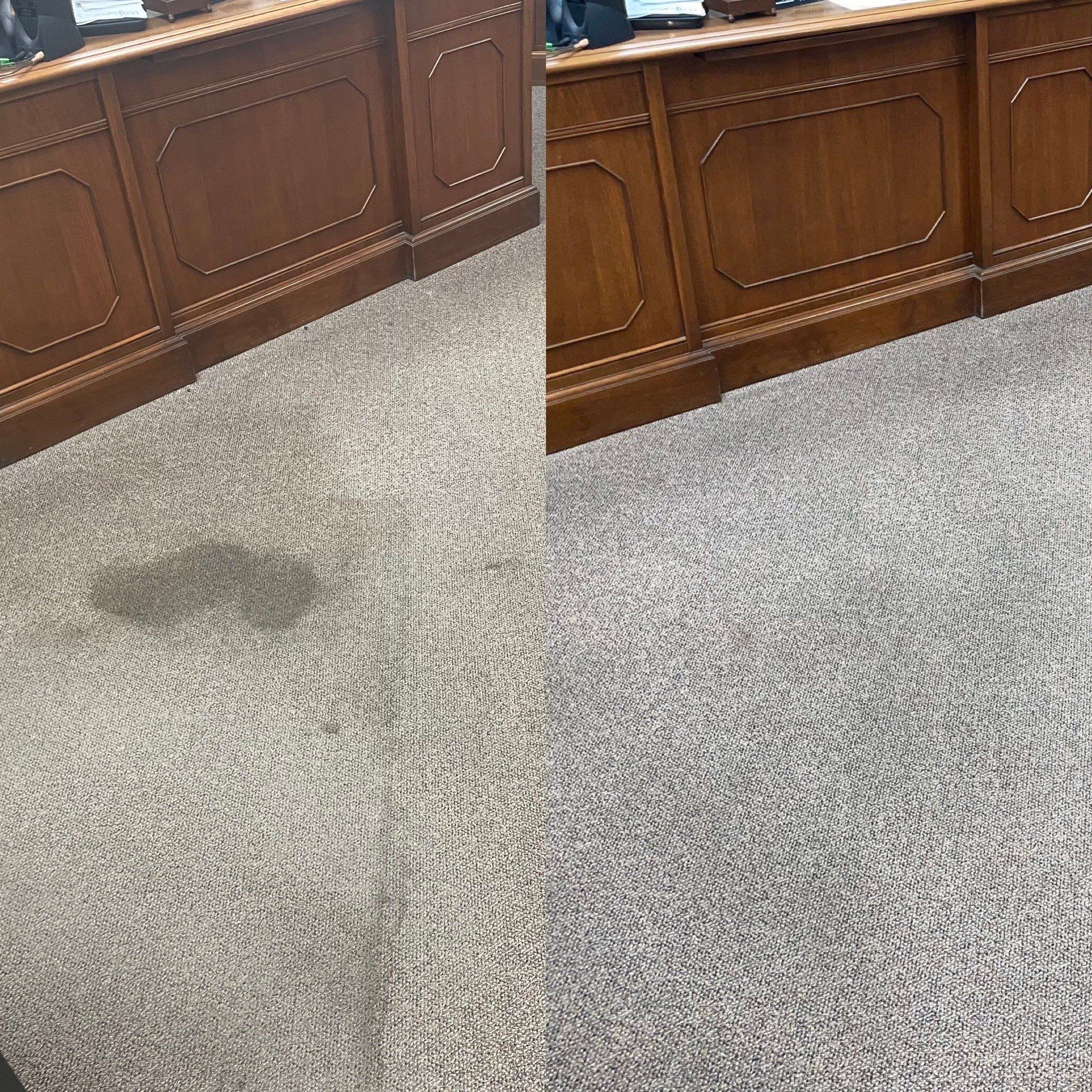 the carpet cleaning service is removing stains and restoring the appearance of carpet in an office setting