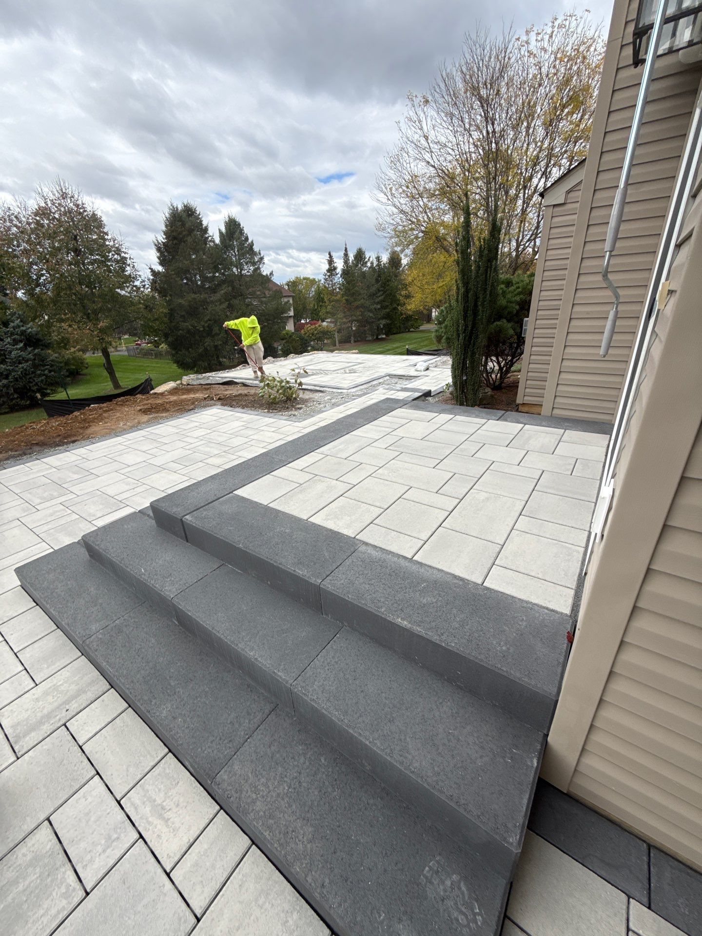 Backyard Retreat: Techo-Bloc Patio + Firepit Lounge by Saylor’s Lawn & Landscape