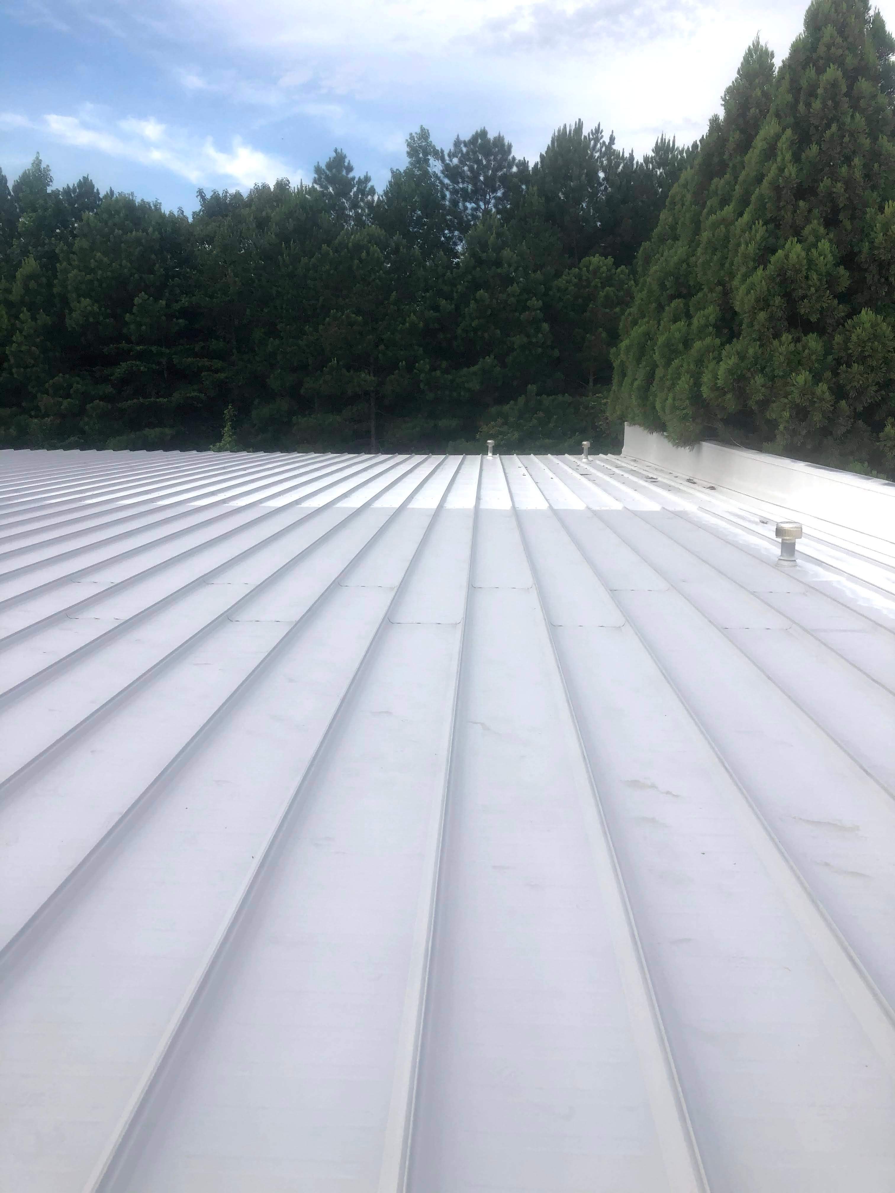 122,220 SQ Ft Standing Seam Metal Roof Restoration in Buford by Southern Roof Solutions