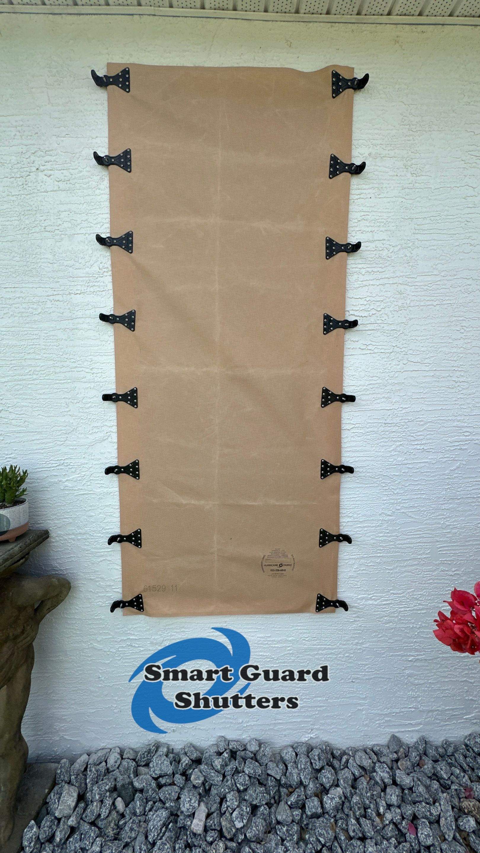 AstroGuard Hurricane Fabric in Tan by Smart Guard Shutters