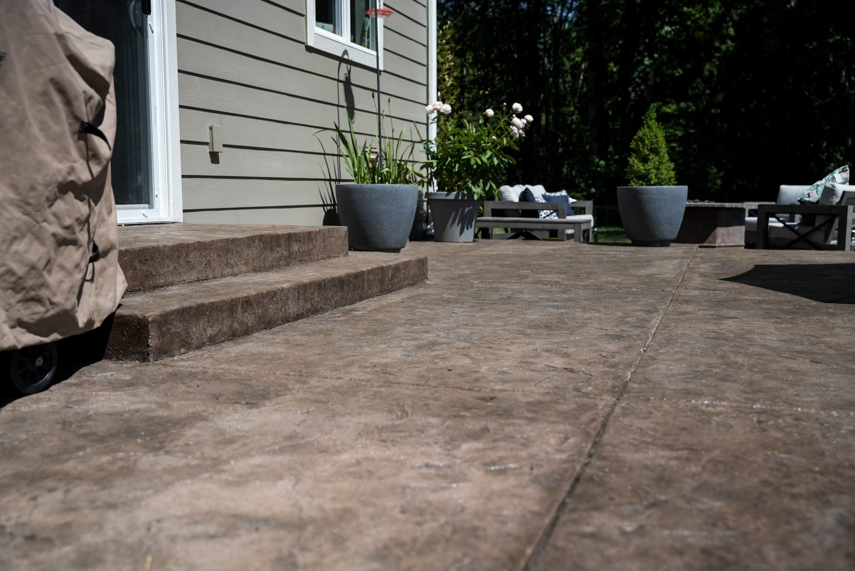Mandy | Stamped Concrete Patio & Driveway by Jireh Asphalt & Concrete Inc 