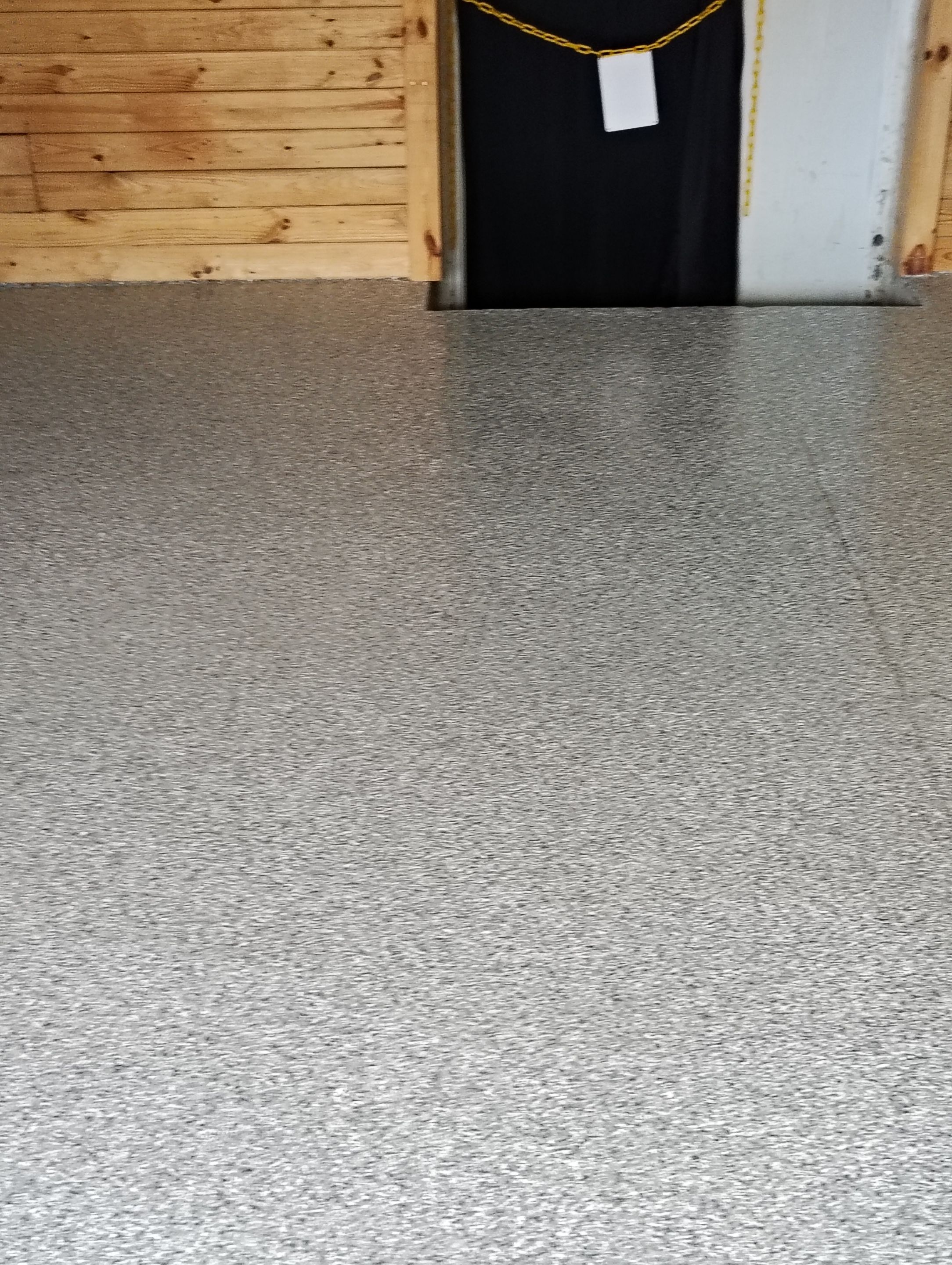 Commercial Epoxy Flake Floor Coating in Emmetsburg, Iowa by Select Painting, Coatings & Garage Cabinets