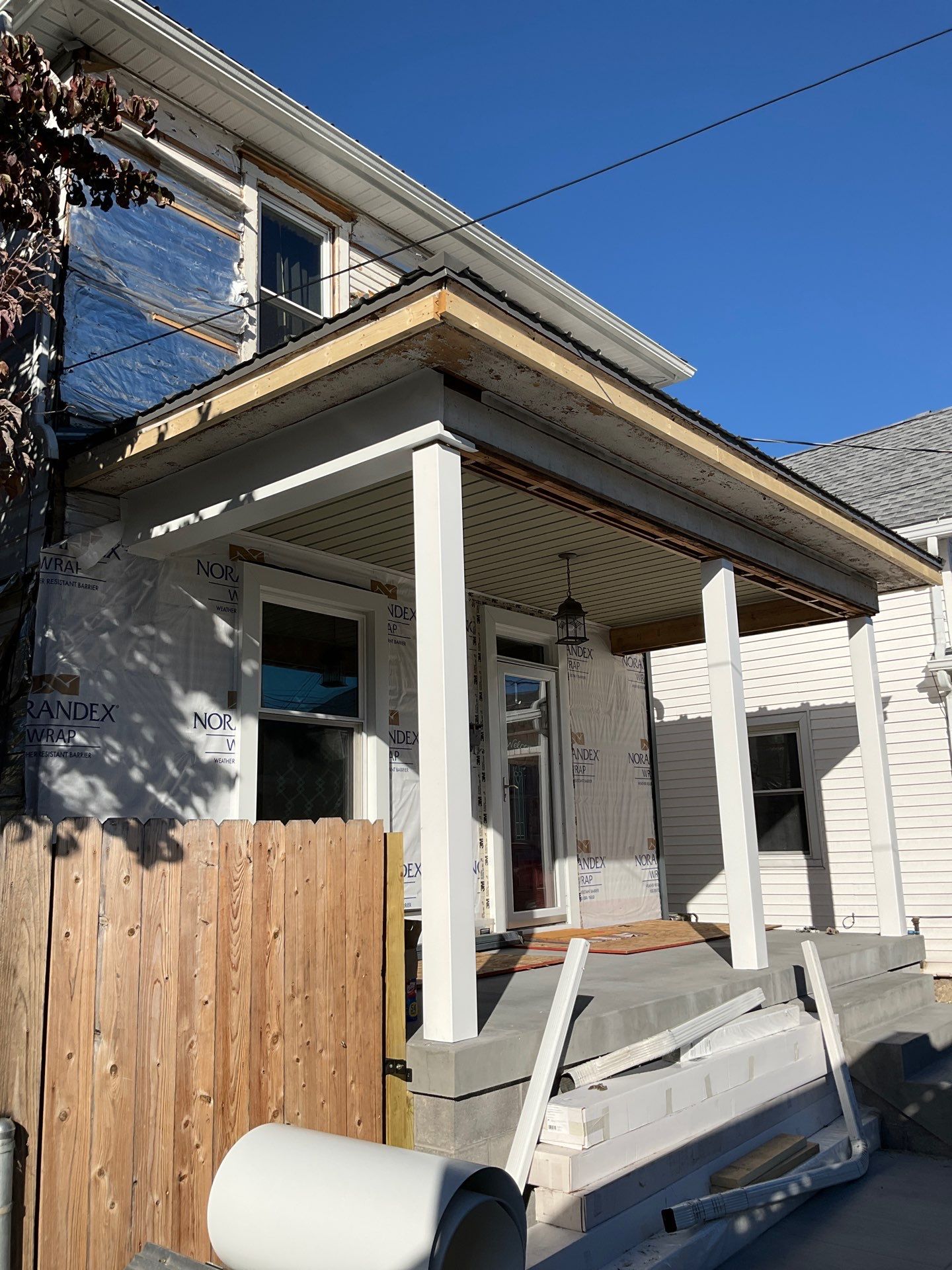 Charcoal Metal Roof & Blue Siding — A Refreshing New Look by Esh Builders