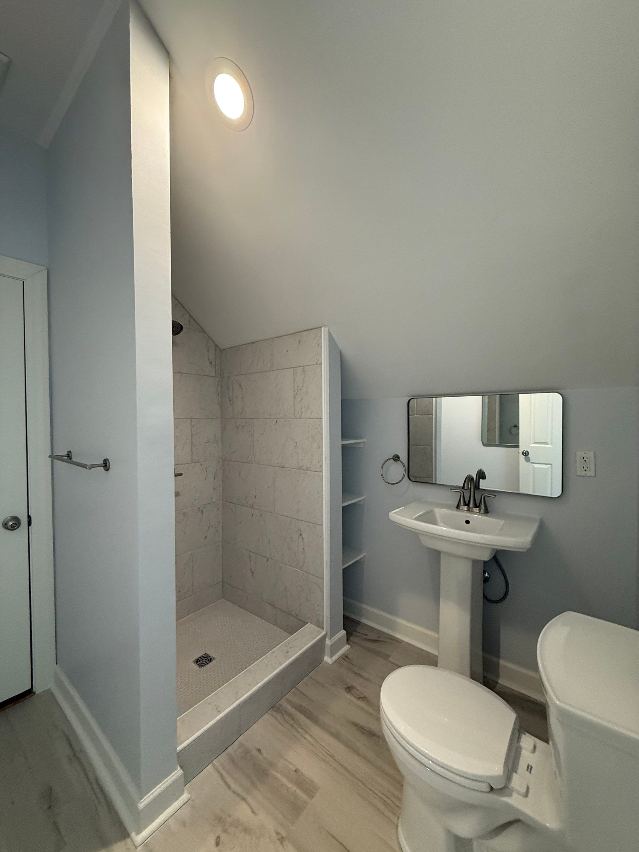 Attic Conversion by Skilled Construction LLC