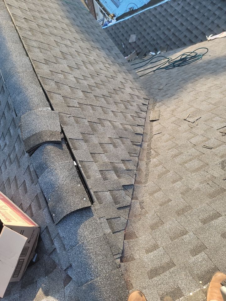 Residential Roofing Installation using Roof Replacement by American Roofing & Construction LLC