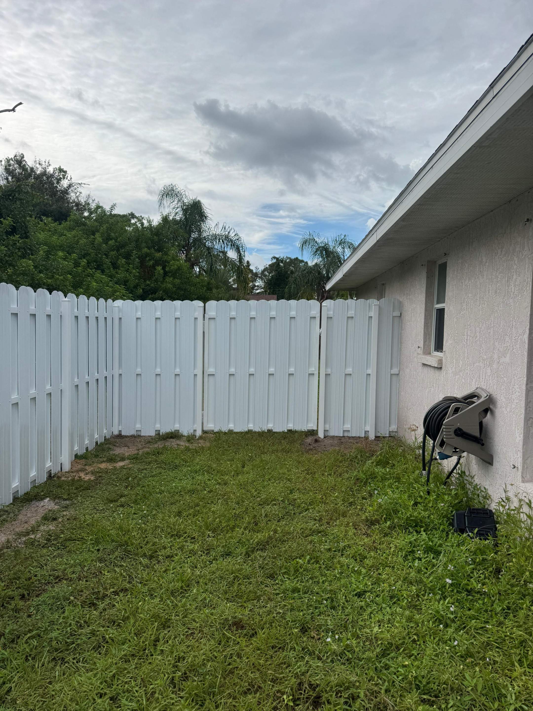 White Vinyl Privacy Fence Installation in North Port by True Fence LLC