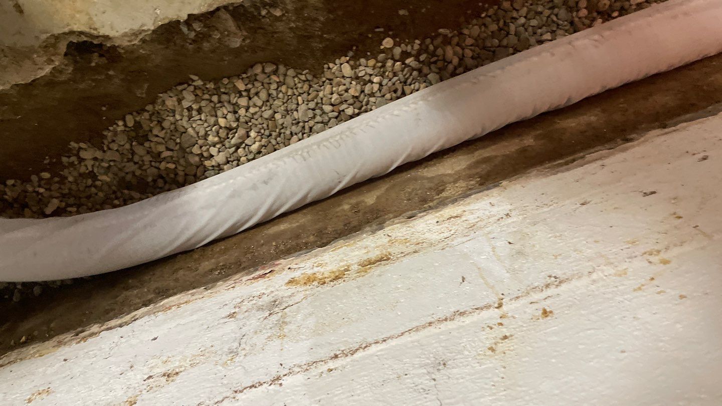 Interior Drain Tile & Yard French Drain in St. Paul, MN by Waterproofing Northeast