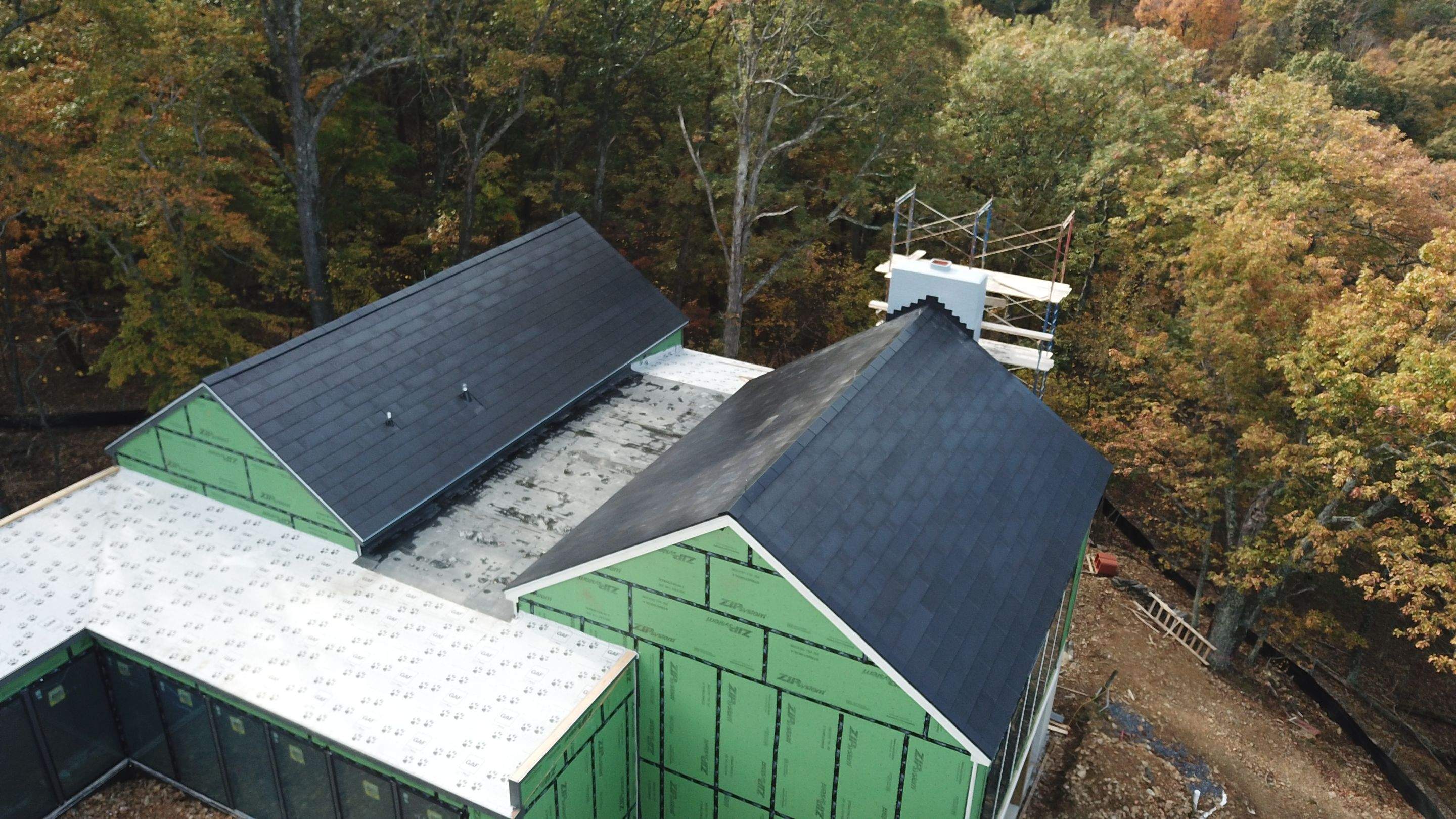 Roof Installation using Tesla Solar Roof V3 by American Home Contractors
