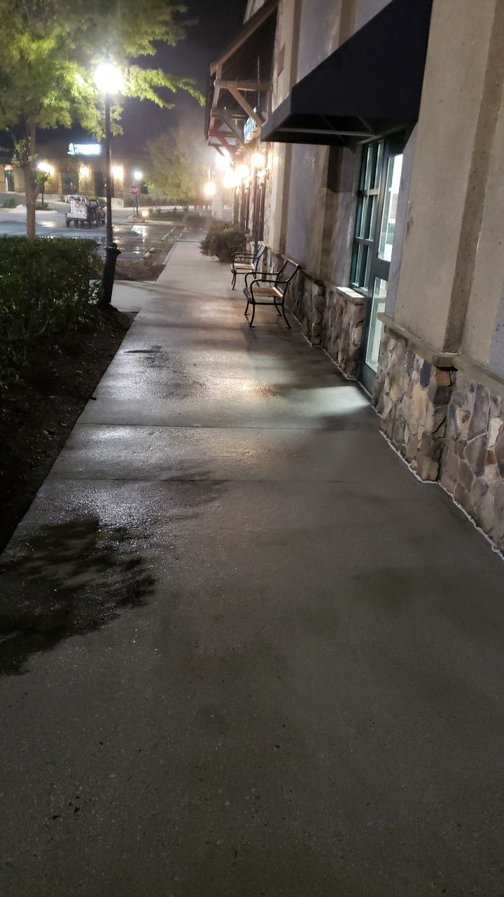 contrete cleaning using cleaner by Power Wash Masters LLC