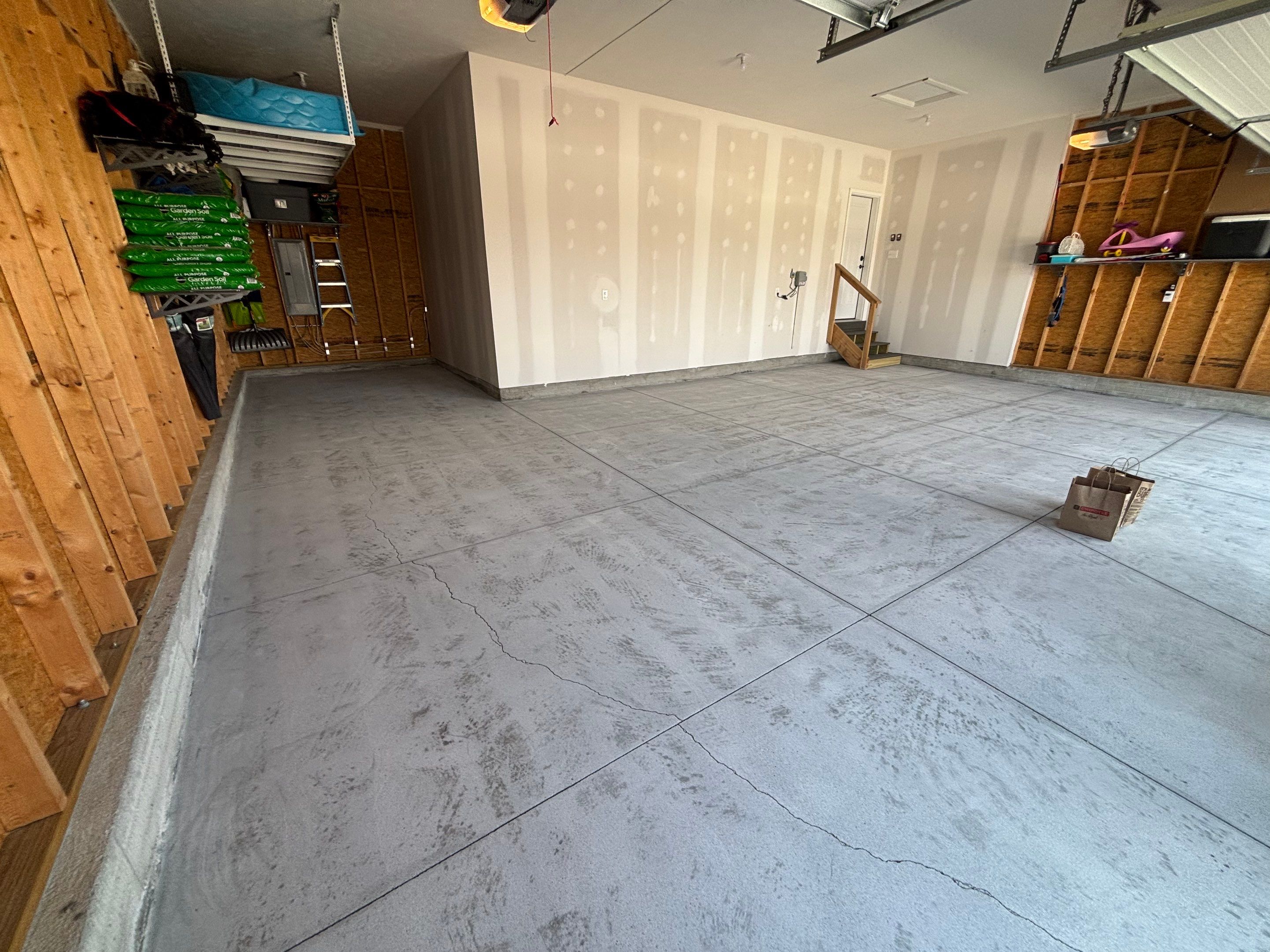 Three-Stall Garage Epoxy Floor Coating Installation in Lincoln by Goat Coatings