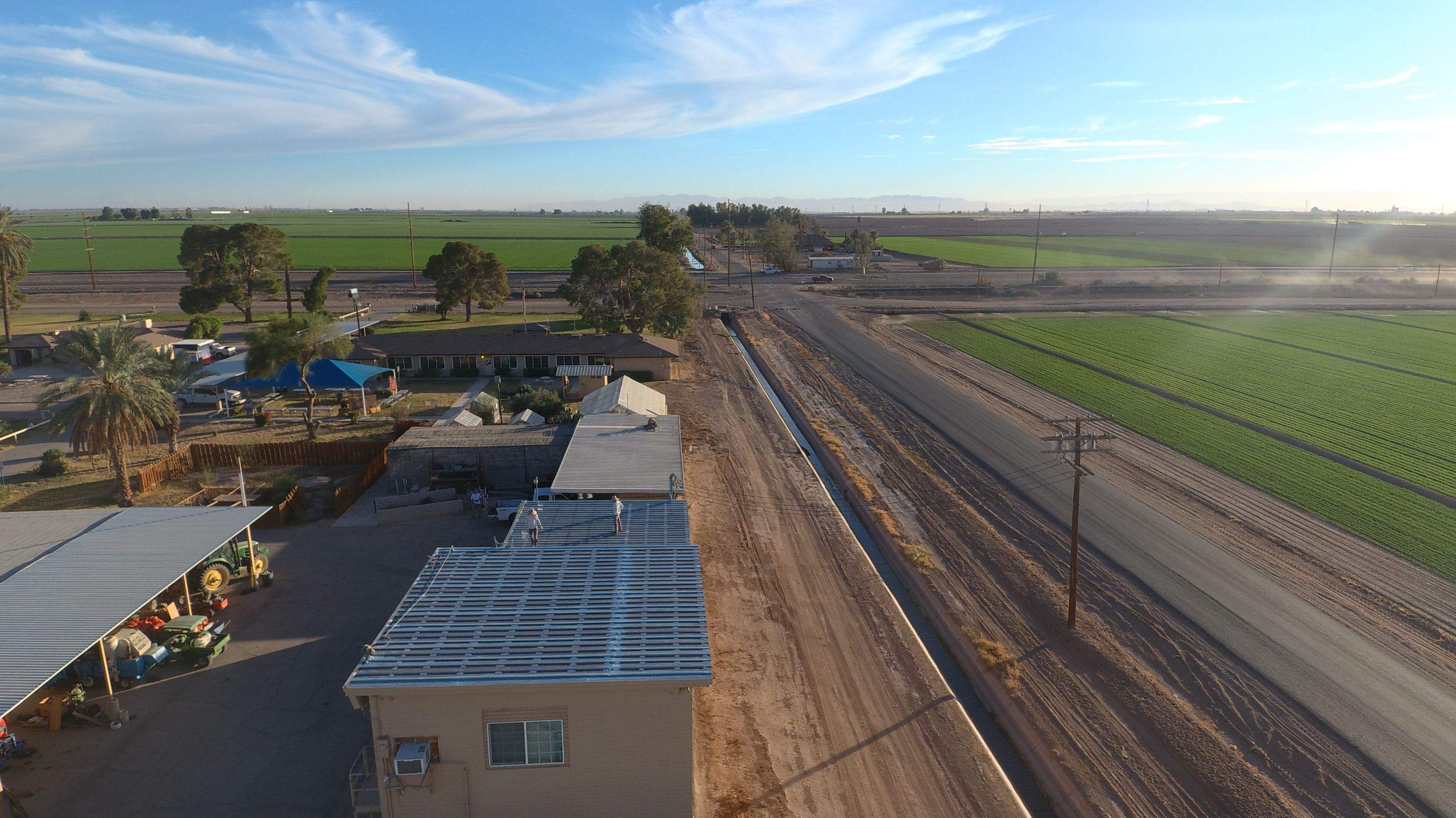 Metal roof restoration on commercial roof using Conklin Benchmark/PUMA XL fabric and coating by Straight Edge Roofing Inc