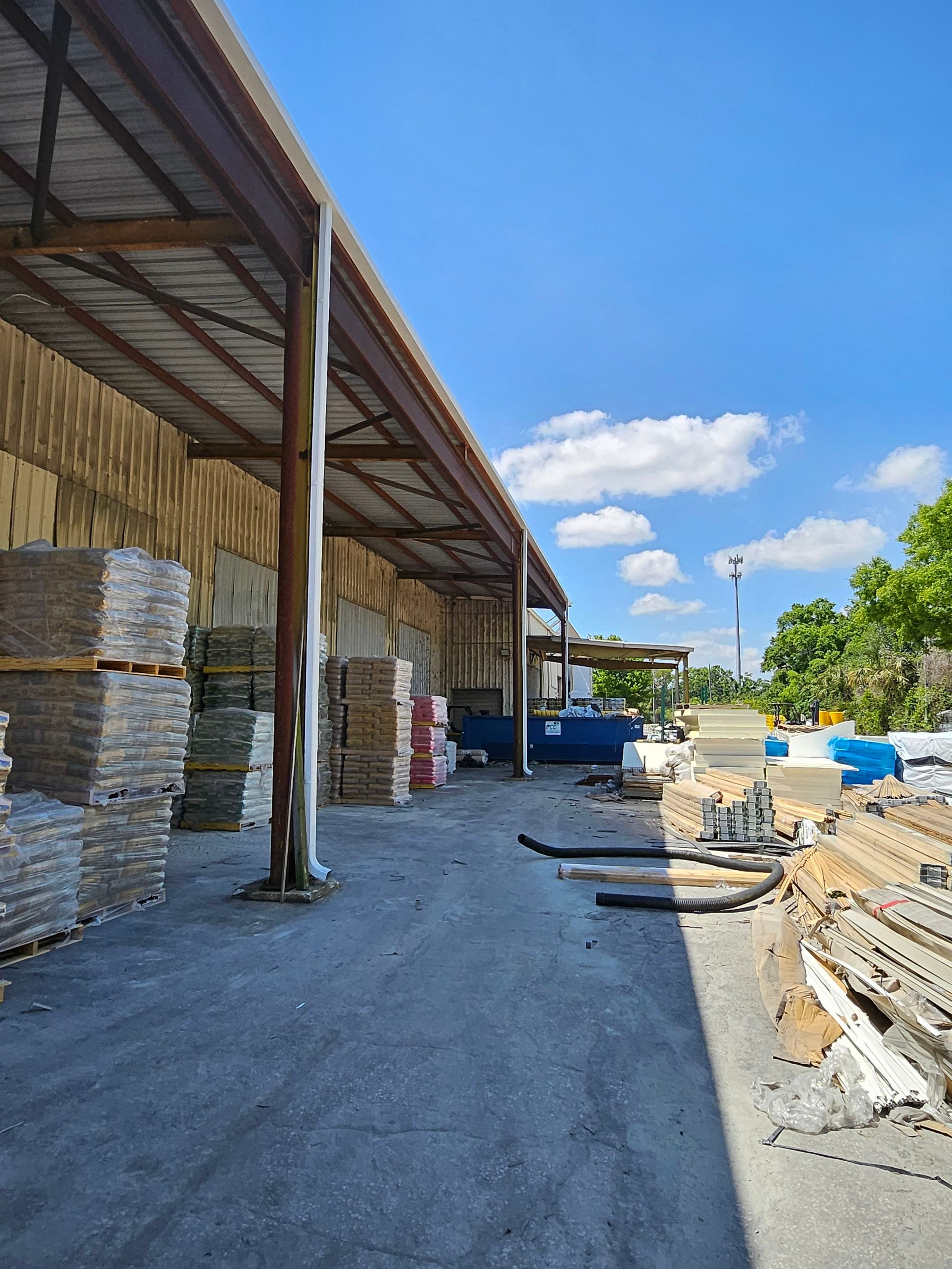 Commercial Box Gutters and White Downspouts Installation in Tampa FL by Gutter Professors