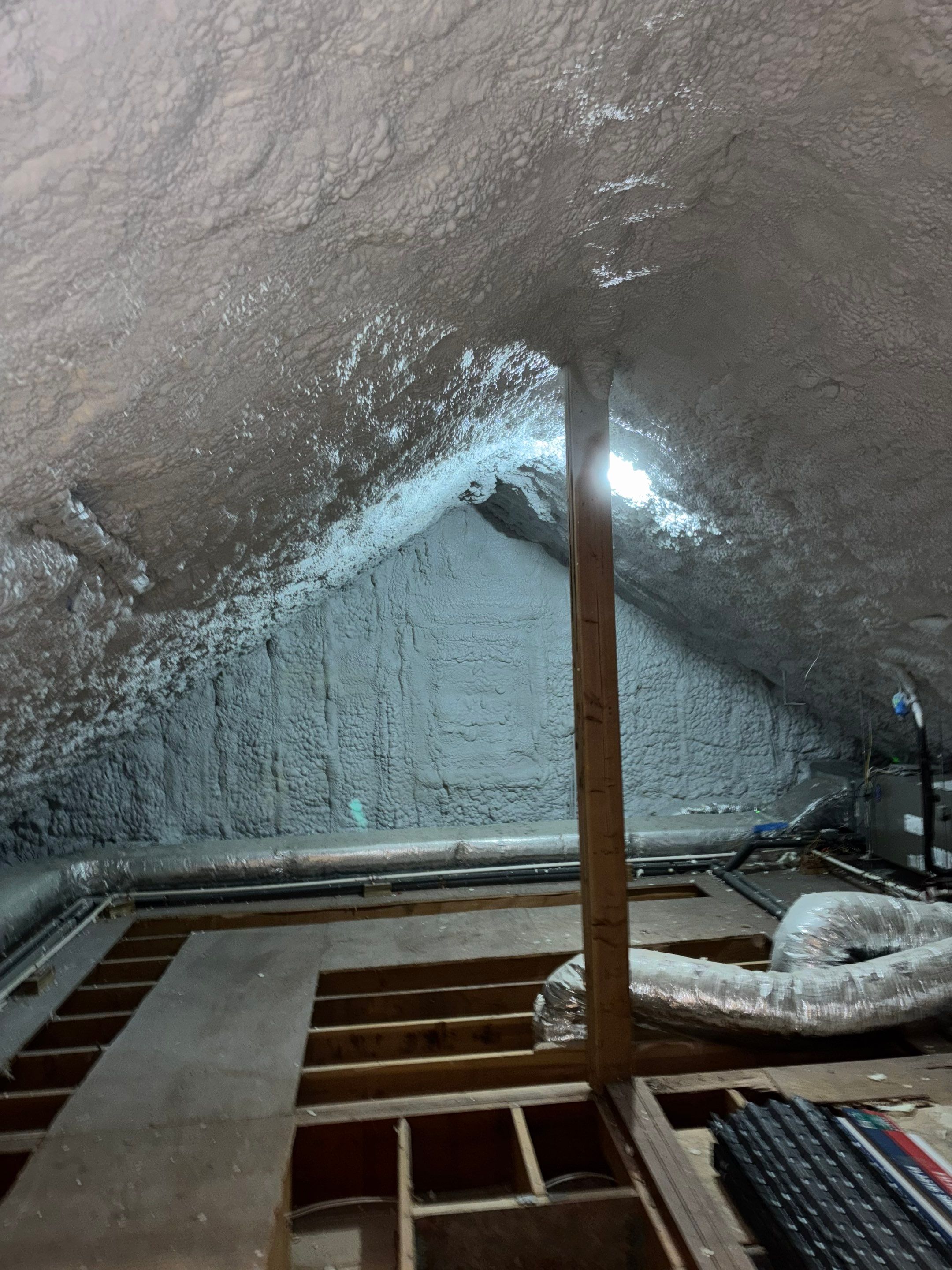 Attic Insulation using open cell spray foam by NYS Foam & Energy