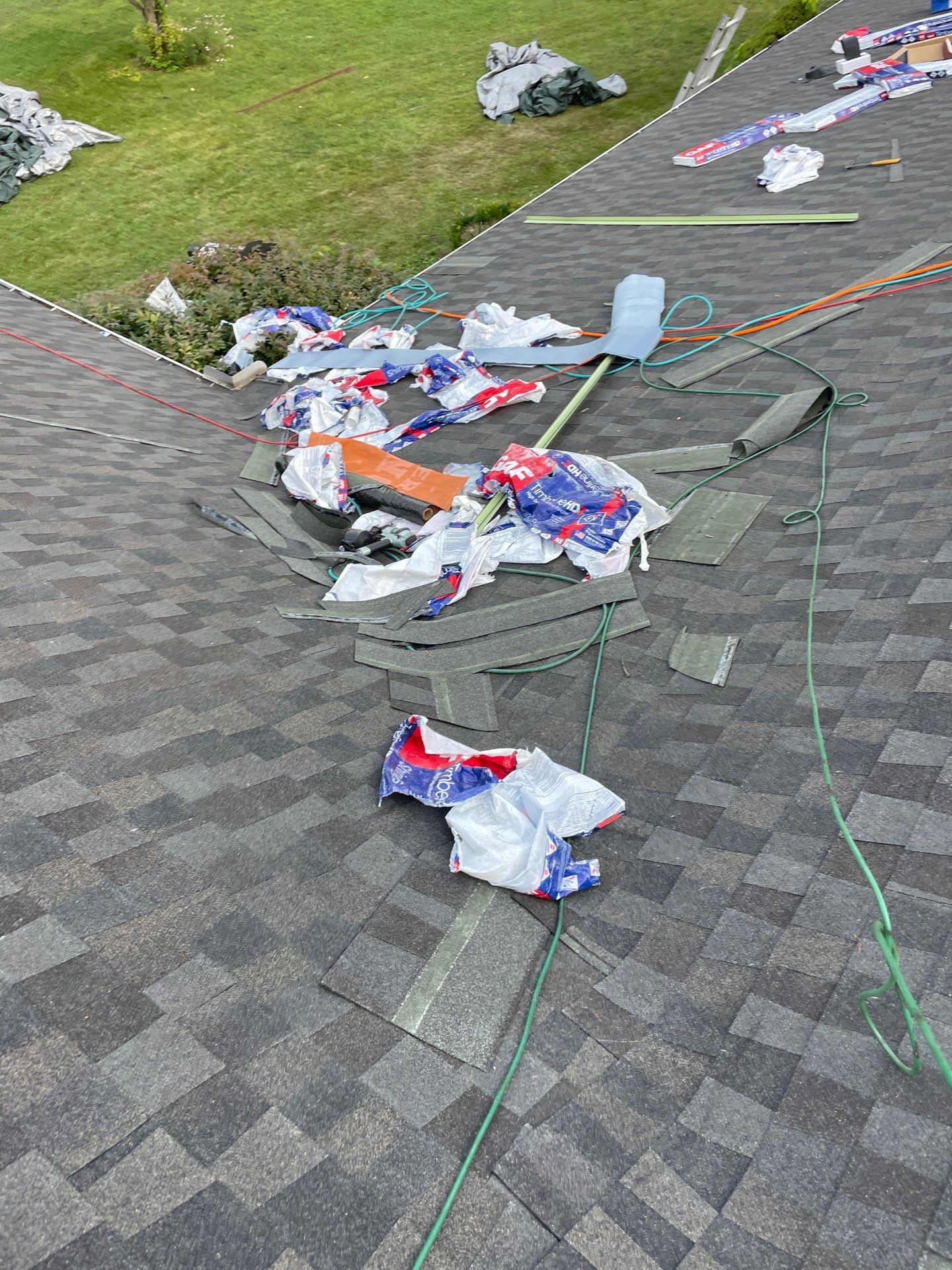 Residential Roofing Installation using GAF Timberline HDZ Charcoal by Rainstoppers Roofing