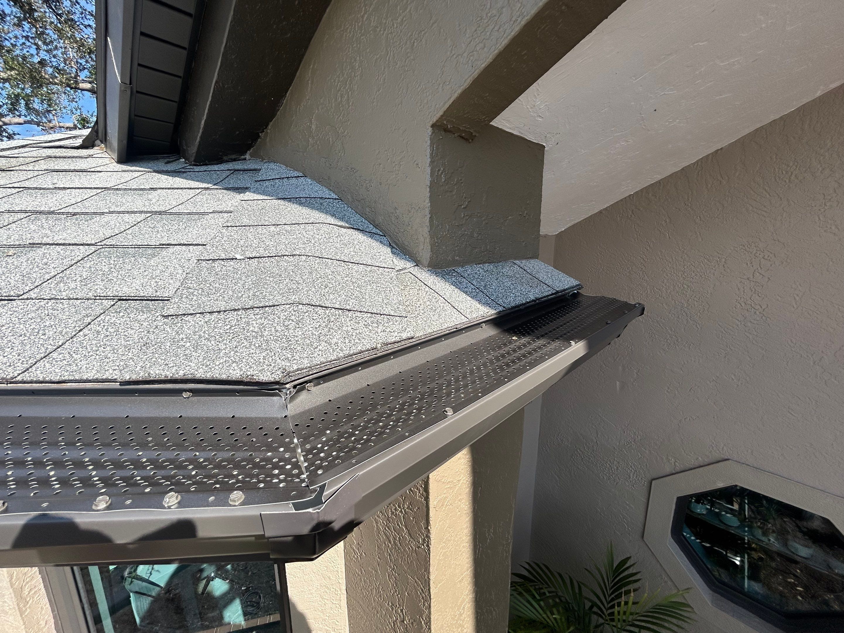 Black Seamless Gutters in Sarasota FL by Gutter Professors