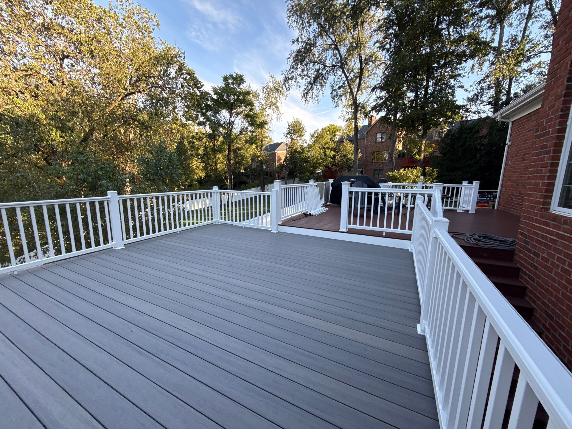 Deck extension  by Cousins Roofing Siding & Decks