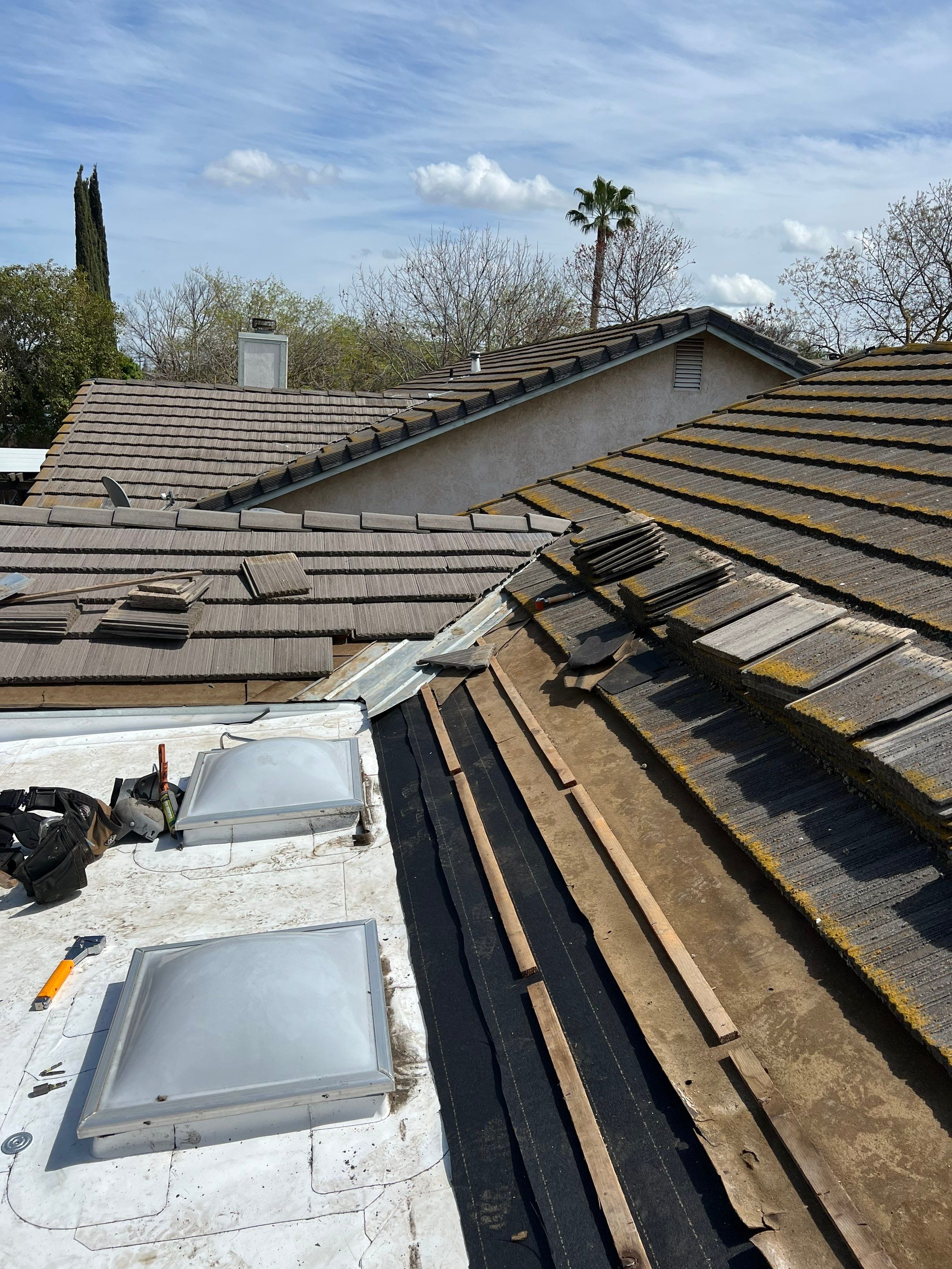 Single-ply roofing system on porch using TPO 60 mil by Straight Edge Roofing Inc