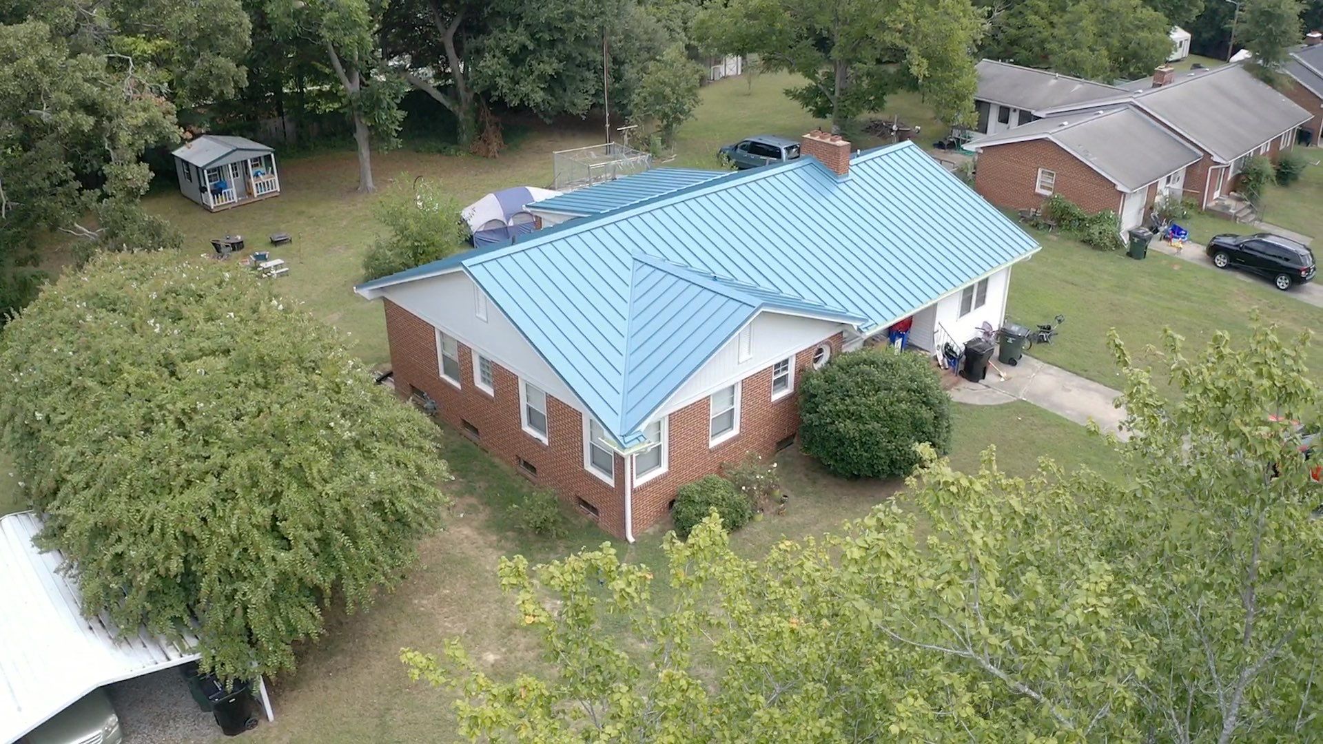 Carolina Blue Standing Seam Roof by Just In Time Roofing and Restoration