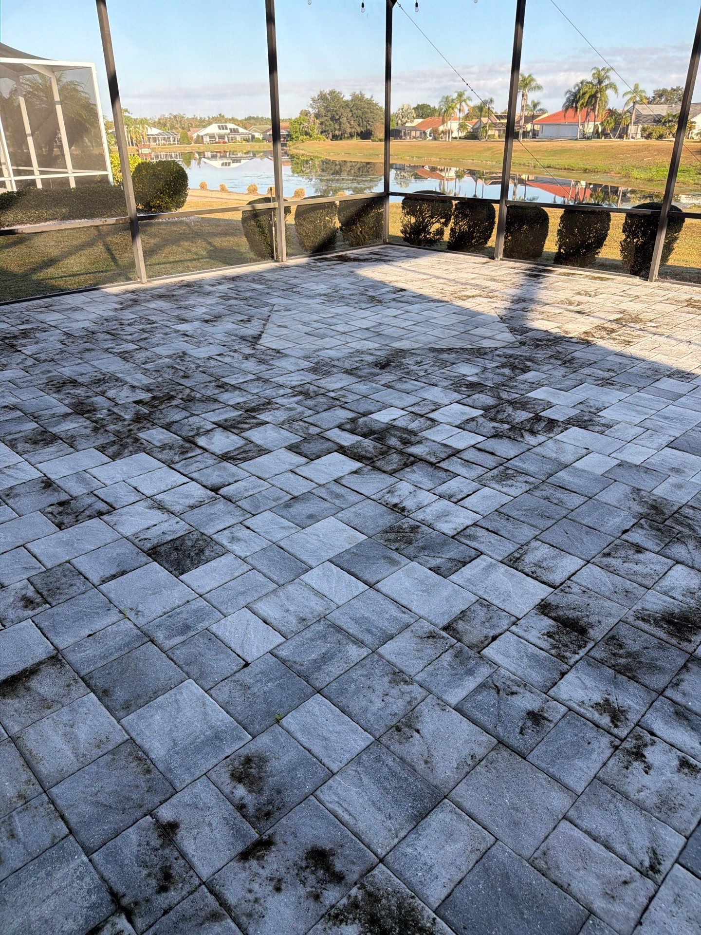 Paver Sealing and Restoration for Screened Lanai in Sun City Center by Supreme Paver Experts