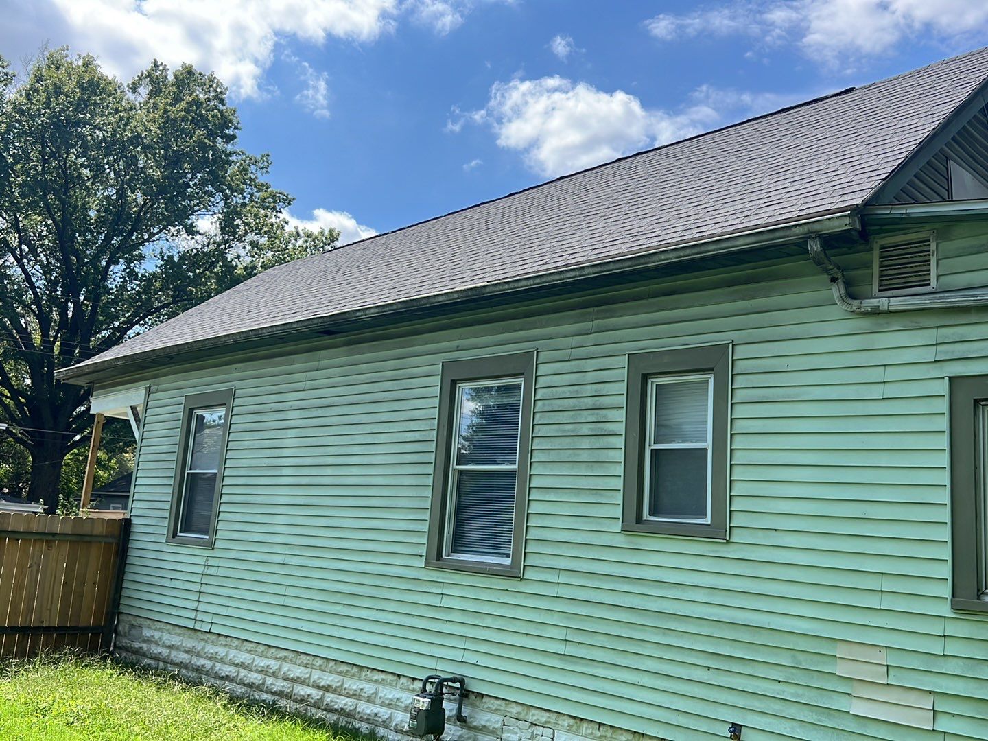 Rental Property Restoration, siding, flooring, gutters, landscaping by Storm Contracting 