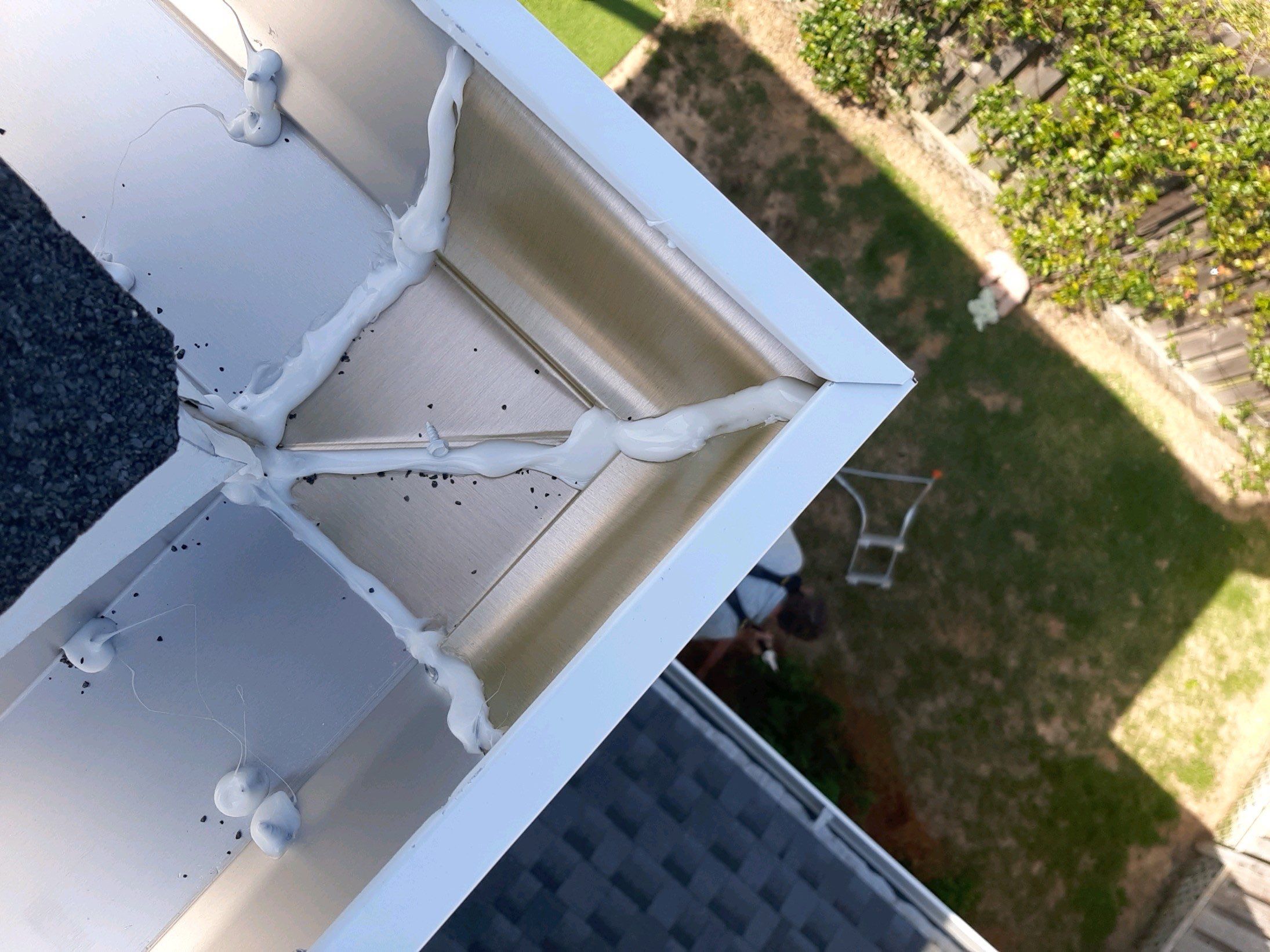 Gutter Installation Using White K-Style 6 Inch Seamless Gutters by Gutter Professors