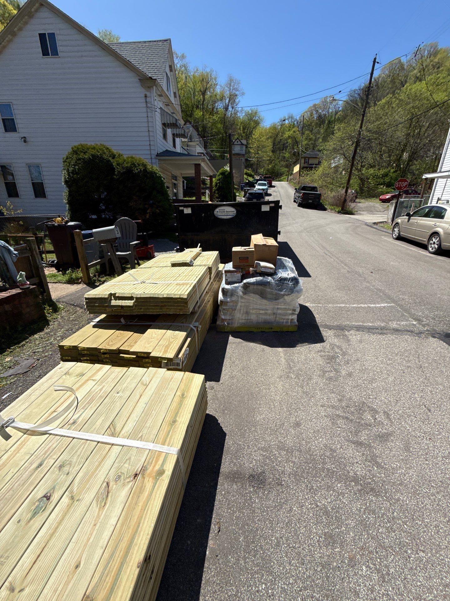 Roof sunspace deck  by Cousins Roofing Siding & Decks