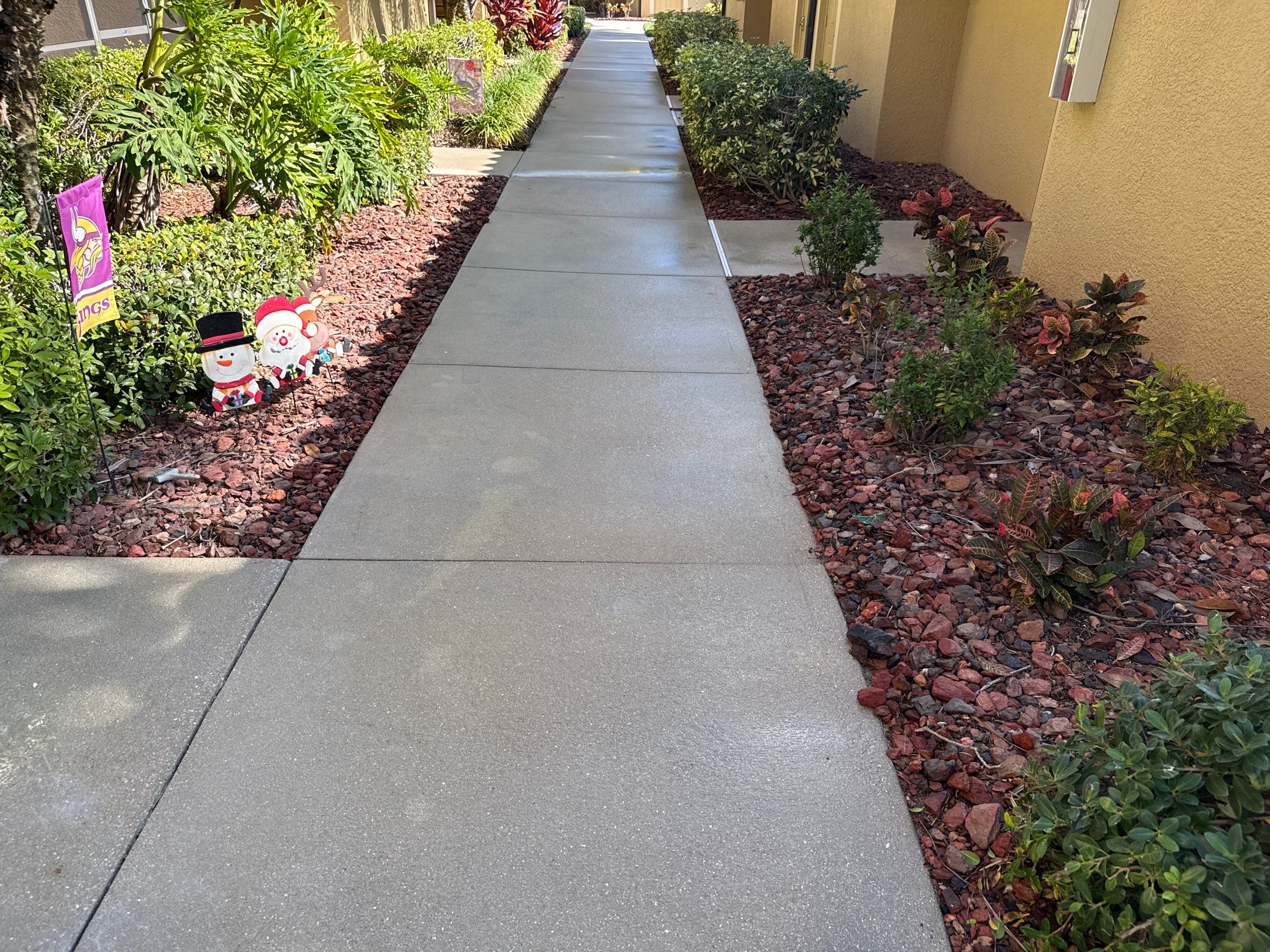 HOA Condo Concrete Driveway & Sidewalk Cleaning – River Strand Community, Bradenton, FL by Sunshine AquaWash