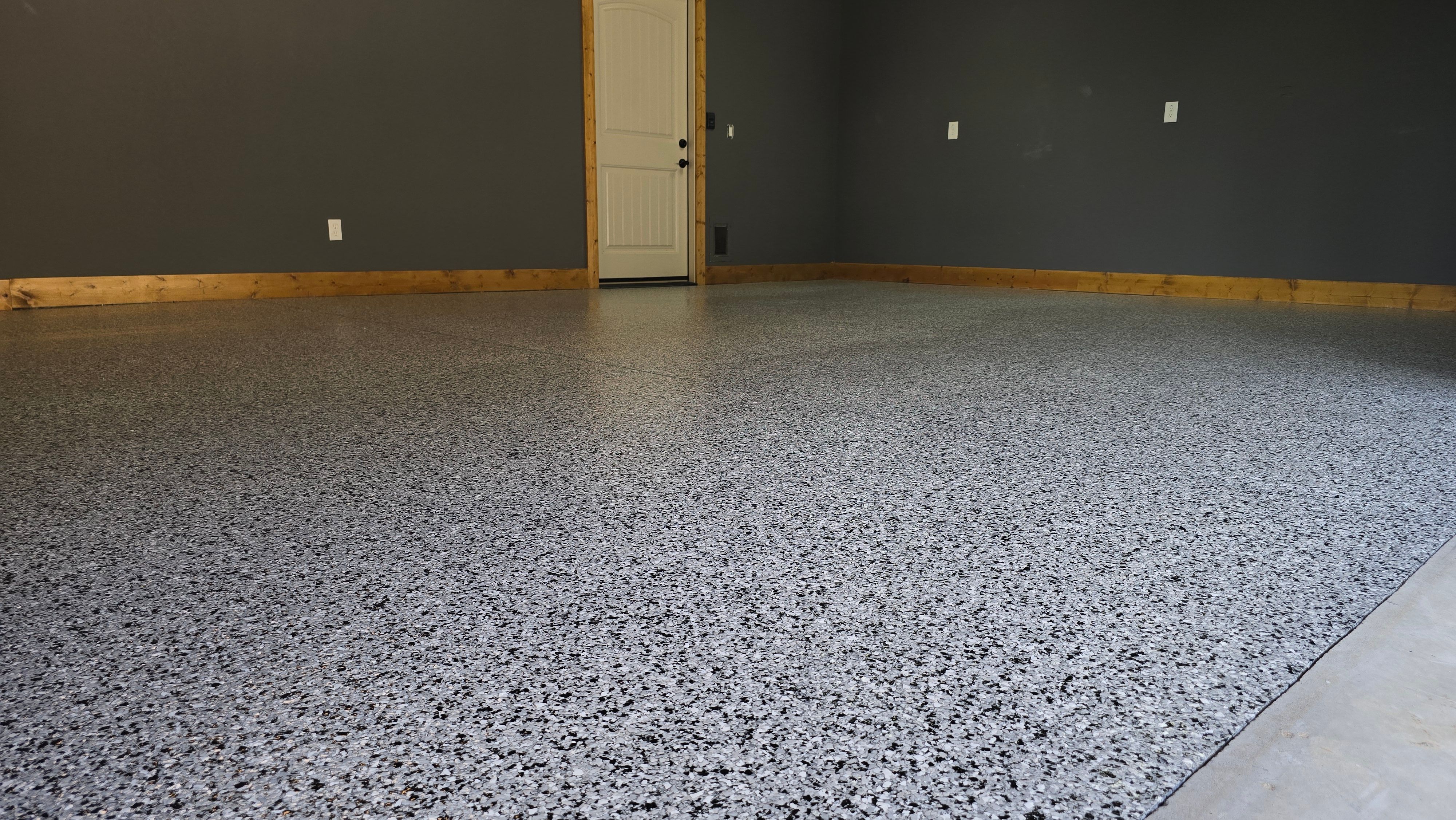 Garage using Houndstooth by Elite Floor Solutions