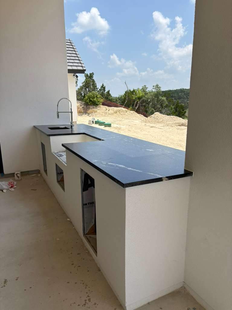 A home with a mix of quartz options by Mena stone surfaces
