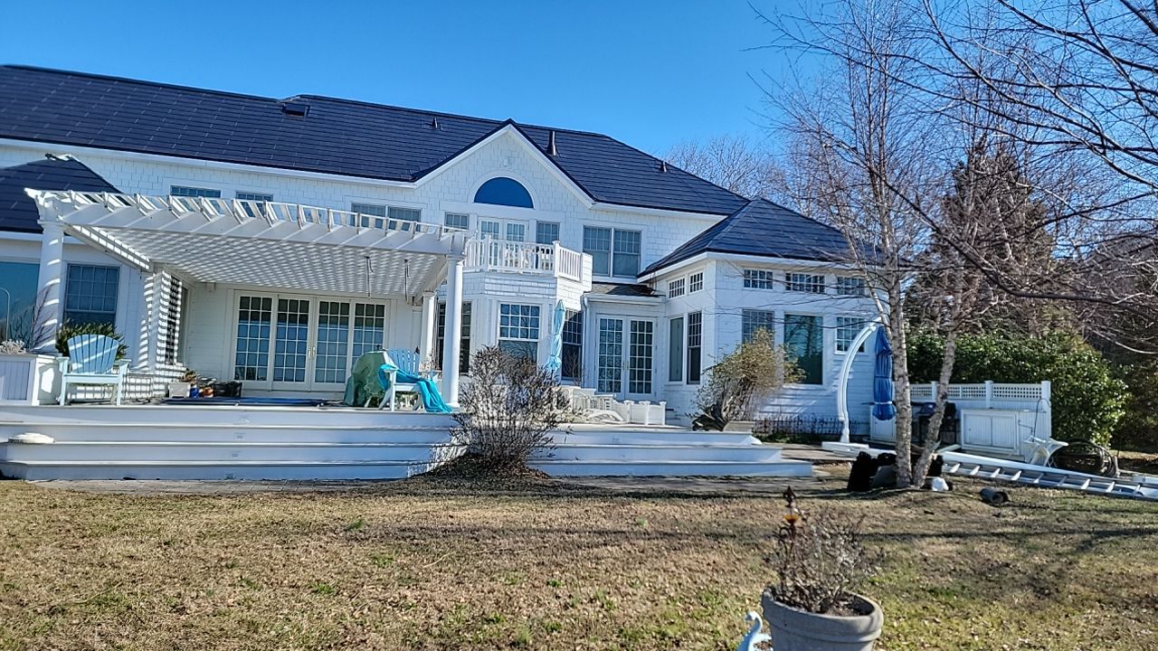 Tesla Solar Roof on the Chesapeake Bay by American Home Contractors