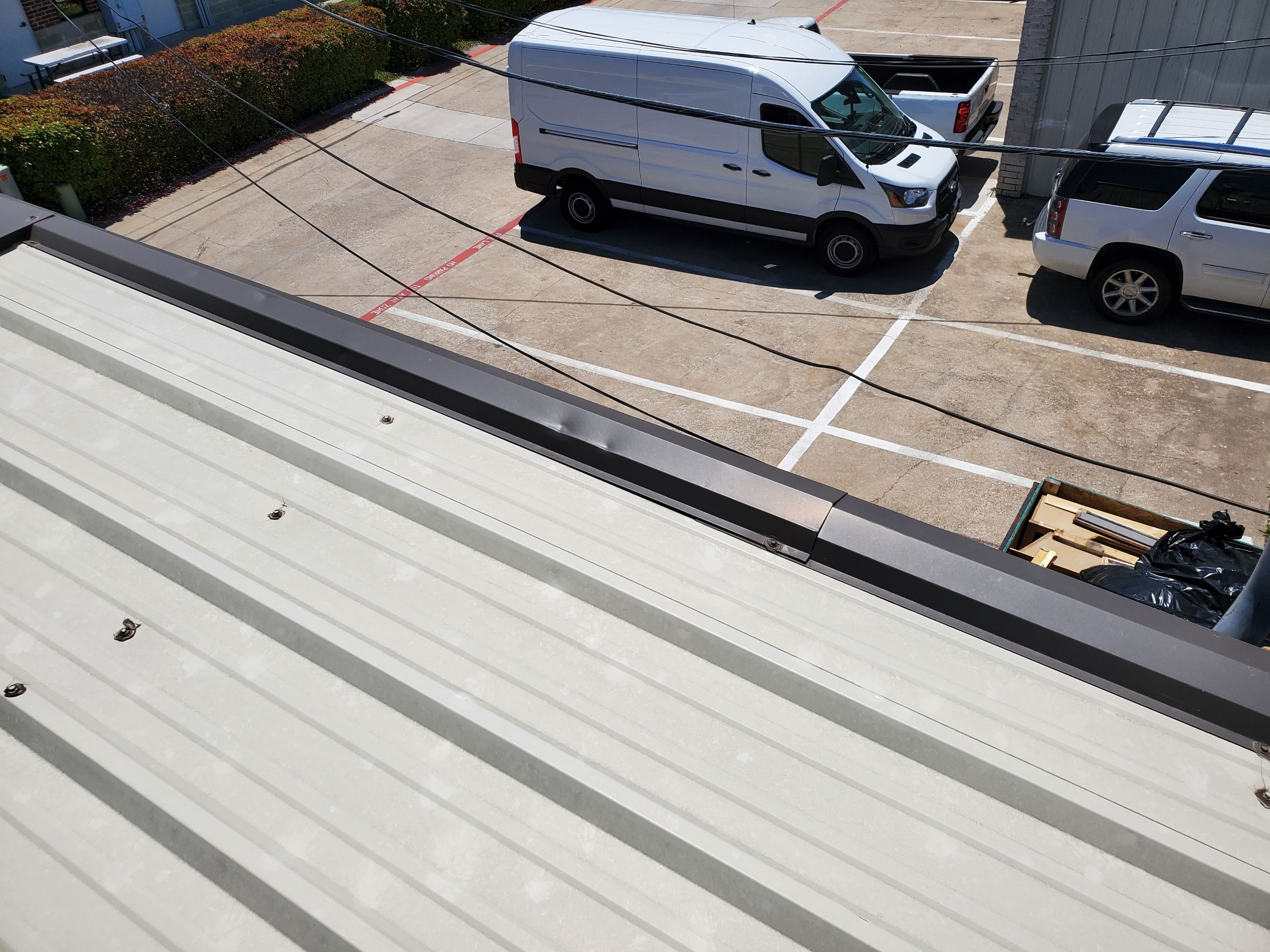 Commercial Roofing Installation using Double lock Mechanical Standing Seam Metal by Becker Roofing and Exteriors