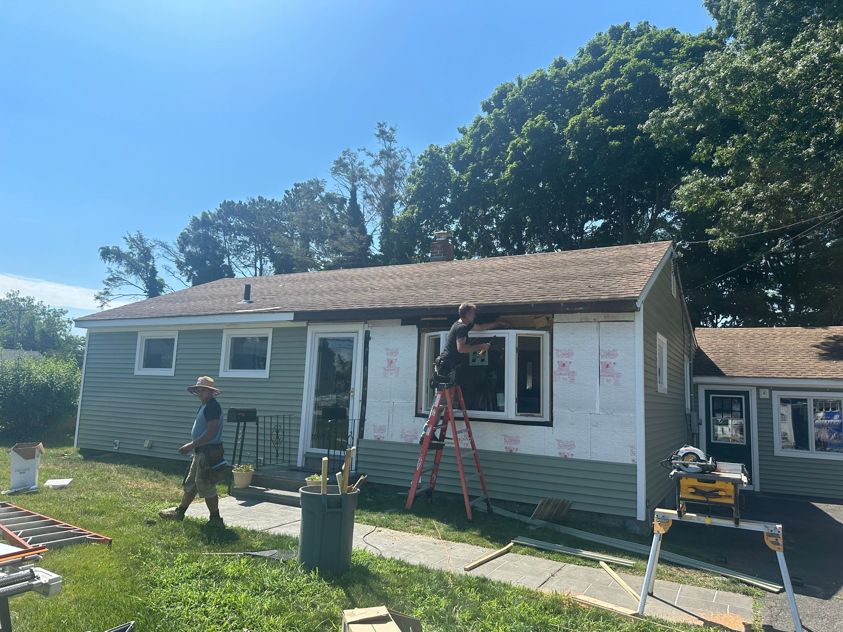 Siding Installation using Clapboard Monogram D4 Cypress by A Plus Exterior