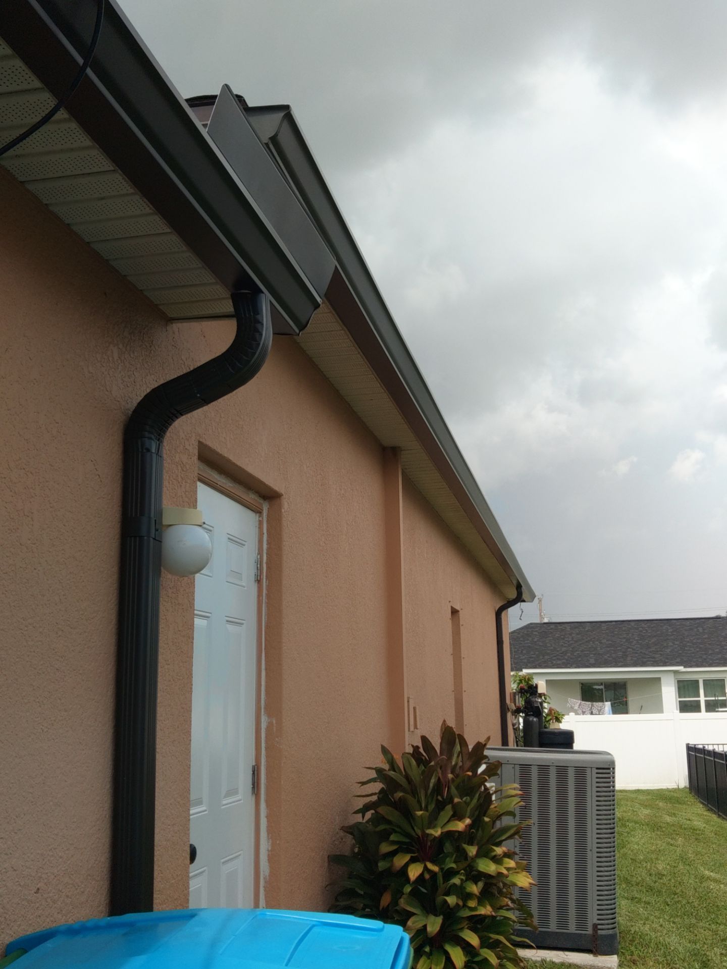 Downspout Installation for Multi-Story Homes in Cape Coral FL by Gutter Professors