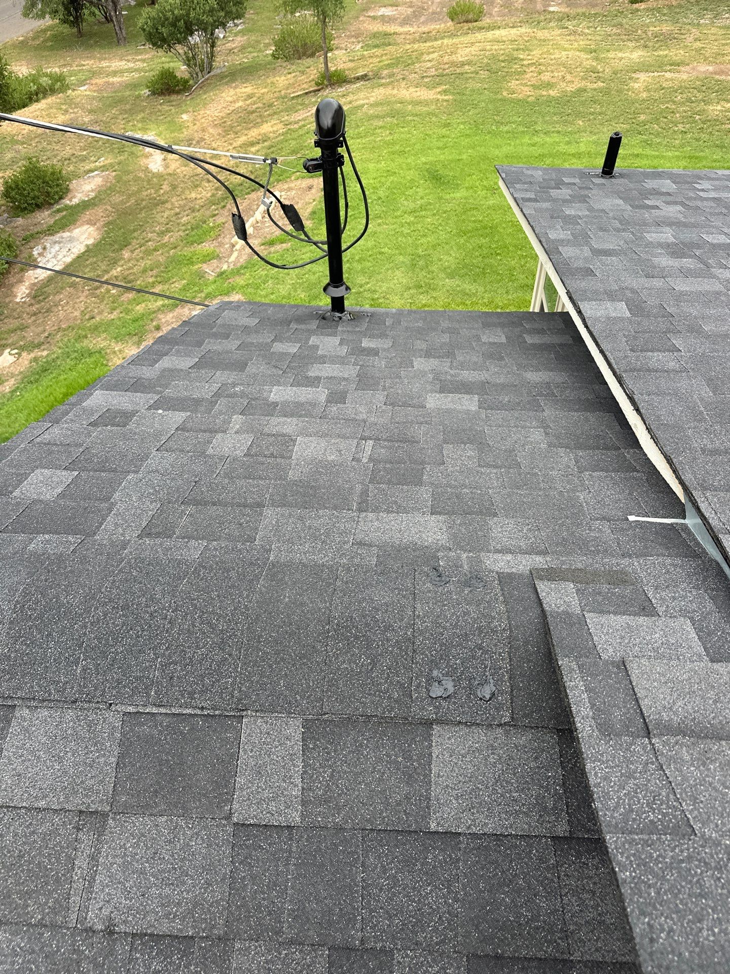 Residential Roofing Installation using Owens Corning Oakridge Onyx Black by DeZign Roofing & Exteriors