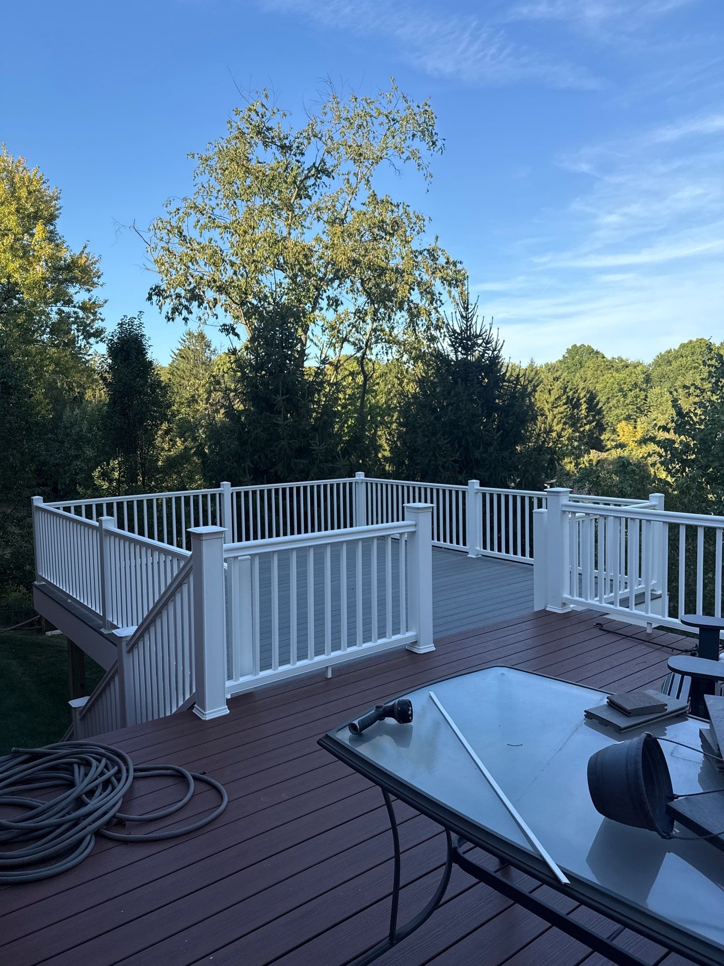 Deck extension  by Cousins Roofing Siding & Decks