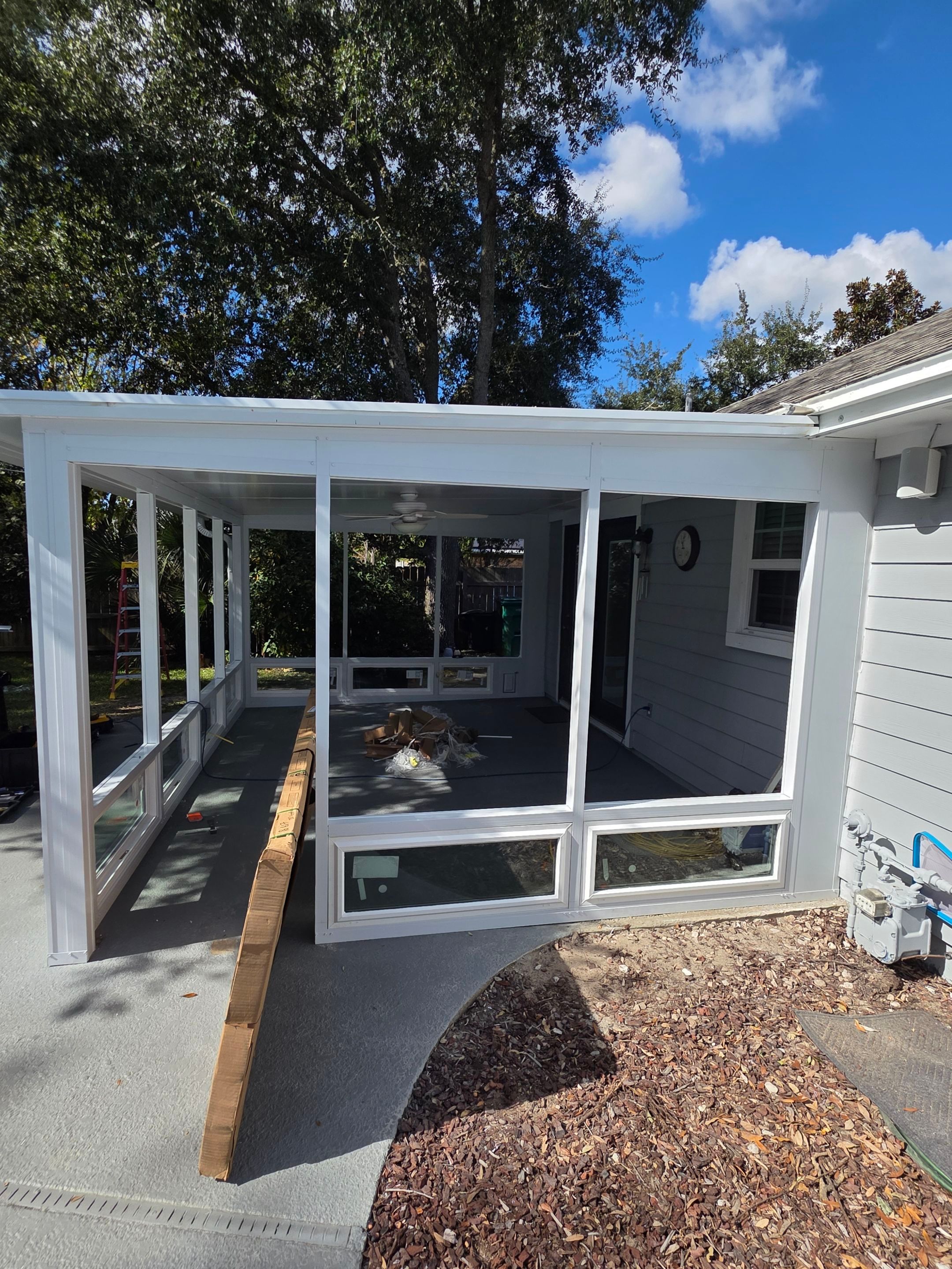 Patio Cover to Glass Room in Mary Esther, FL by Titan Sunrooms