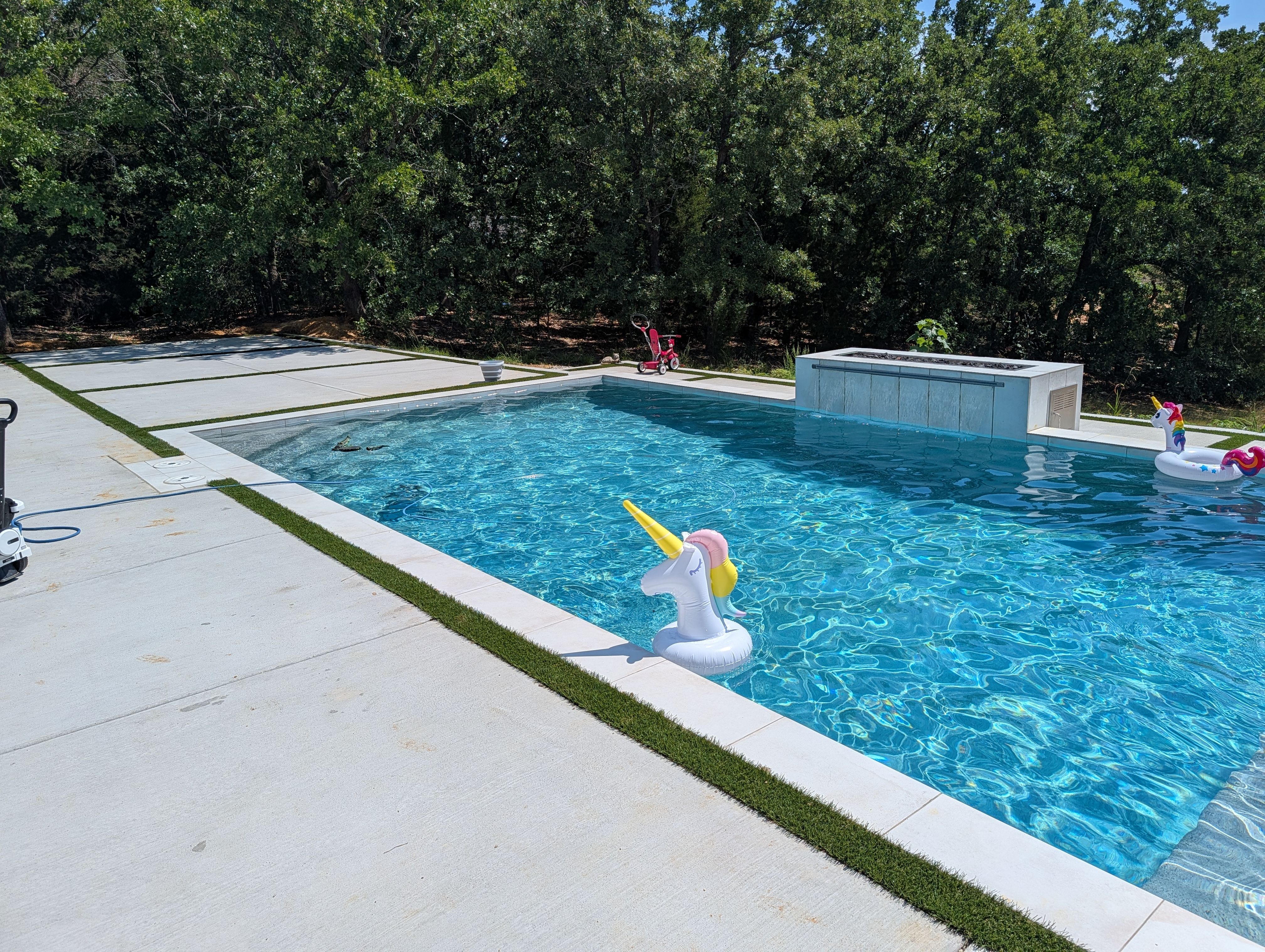 Modern Geometric Pool with Raised Spa and Turf Accents by Pinnacle Pools and Spas - DFW