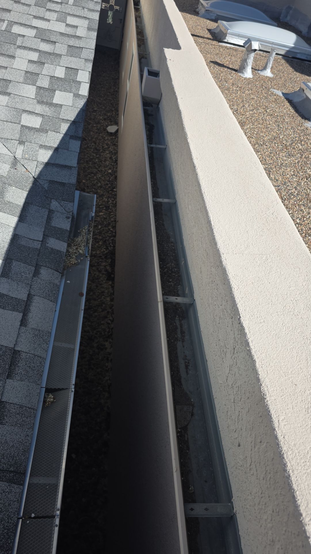 New Dome Skylights and Gutter Guard Installation in Albuquerque by Doyle Roof Masters Inc