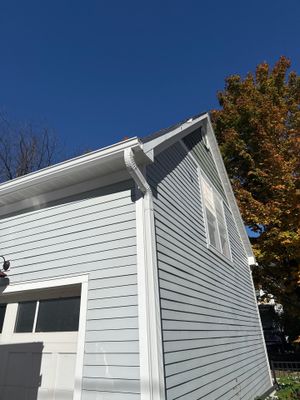 Seamless Gutter and Downspout Installation for Traverse City Garage