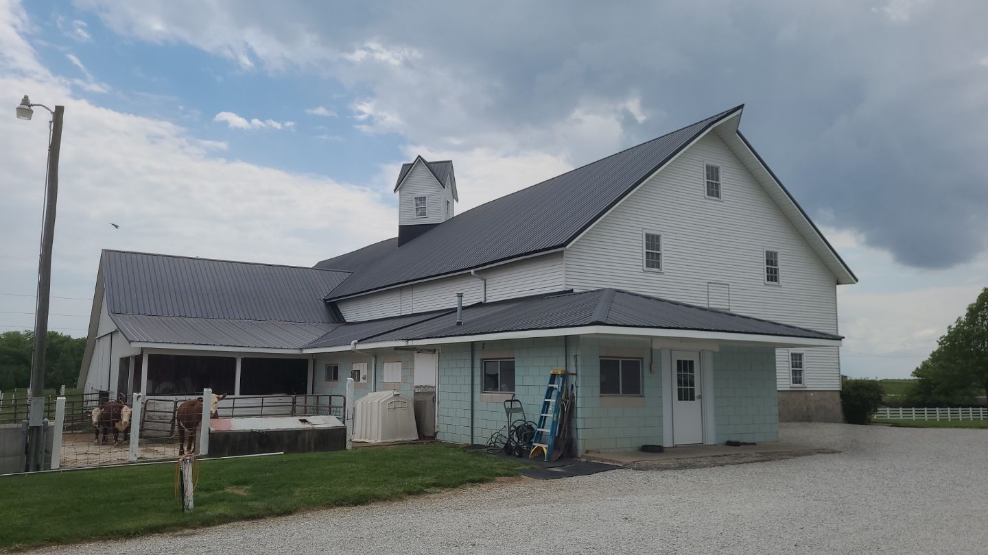 New metal roof on heirloom barn by Dagny Builders