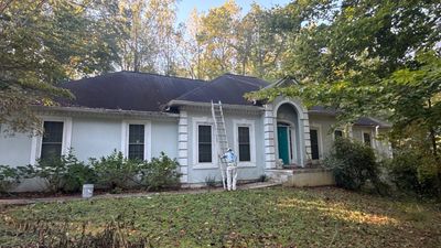 Exterior Residential Painting and Deck Refinishing in Canton, Georgia by Swift Home Renovations 