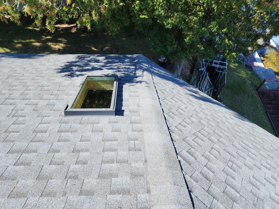 Residential Roof Installation and Skylight Replacement in Kiel, WI by Gellings Roofing & Siding