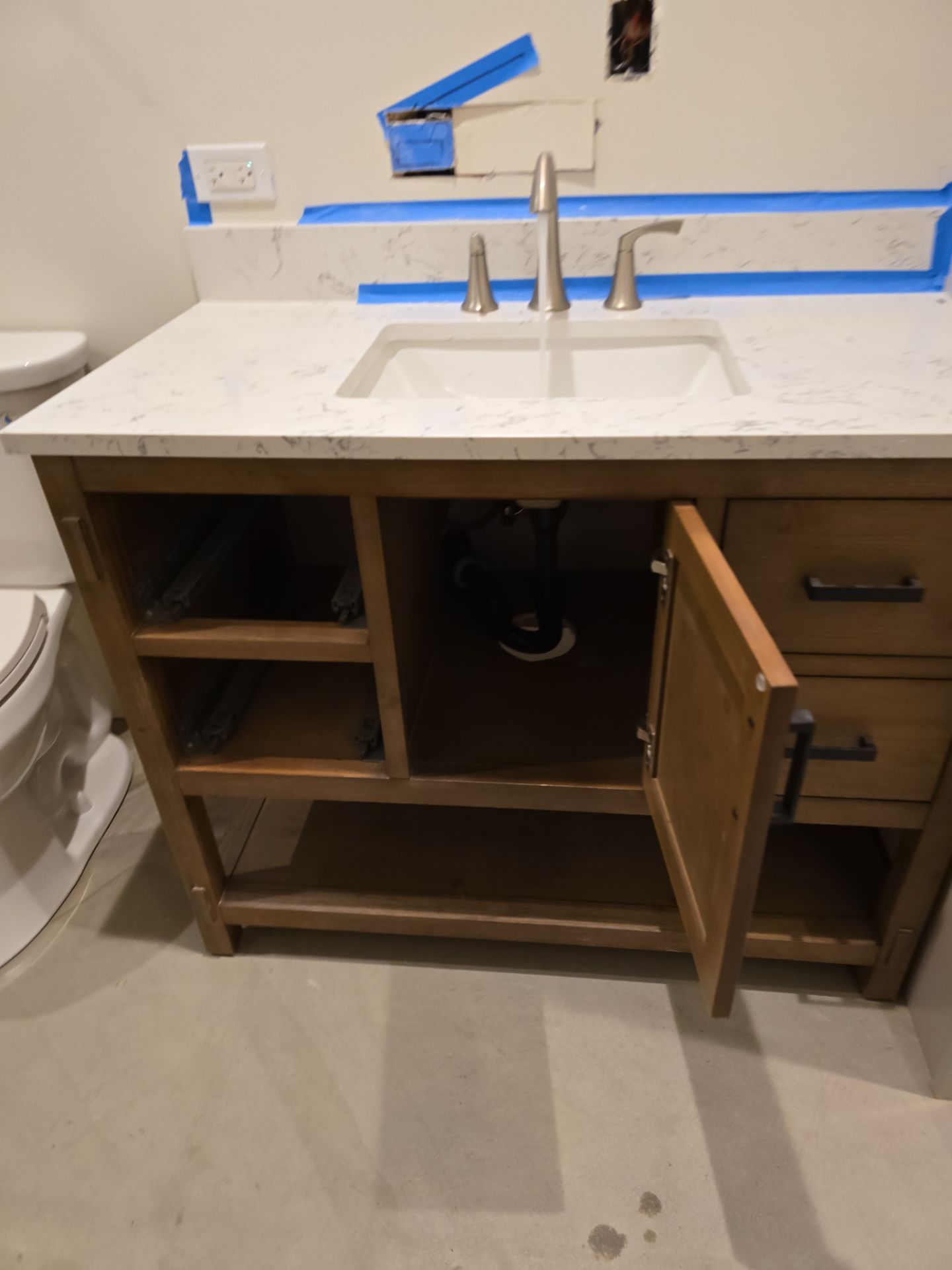 Installation of New Sink Flange, Piping, Fixtures, and Water Heater by Us Plumbing 